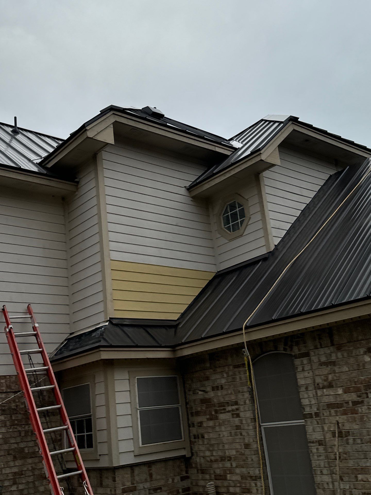 Residential Roof Replacement using 24 GA Double-Lock - Matte Black by Action Exteriors Austin