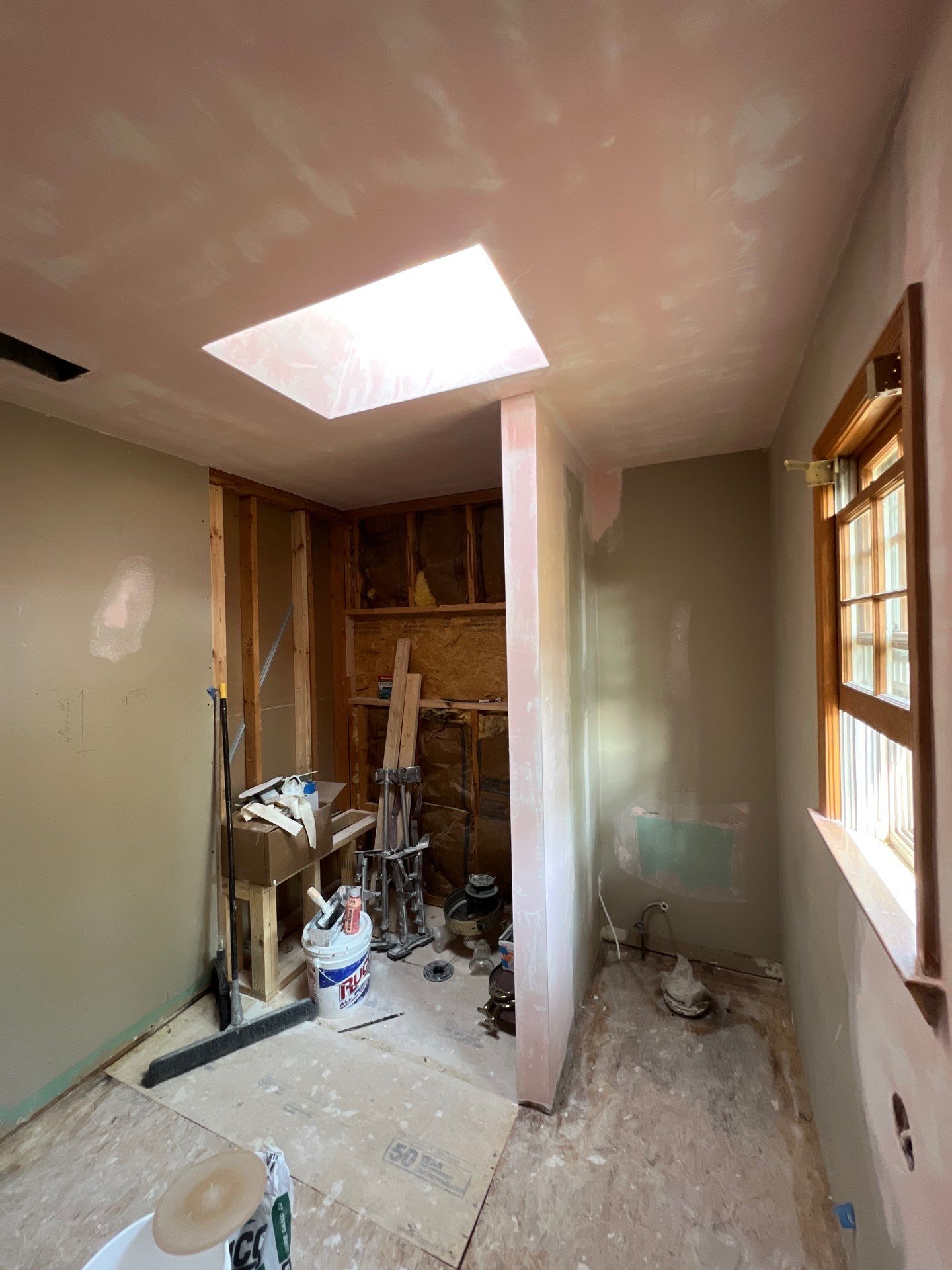 Modern Bathroom Remodeling Featuring Marble Tiles and Custom Cabinetry in Smyrna by Swift Home Renovations