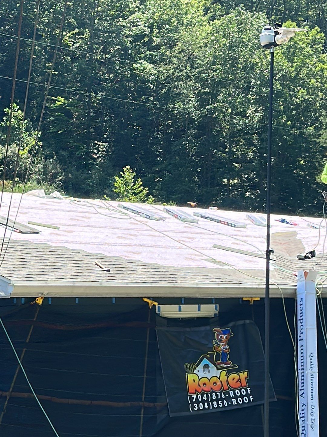 Residential Roofing Installation using Performance Shingles by Mr. Roofer