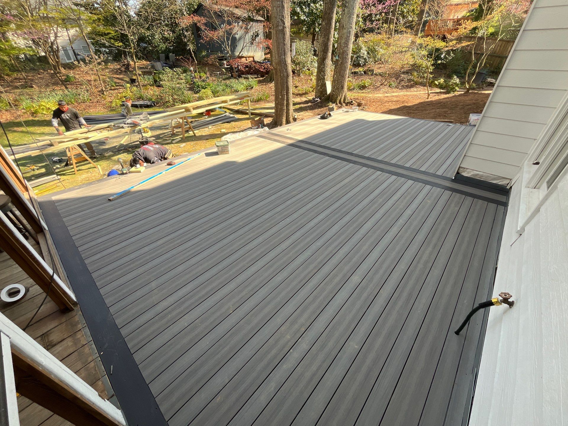 Deck Resurface using Deckorators Voyage Series and ALX Contemporary Cable Railing by Nelson Exteriors 