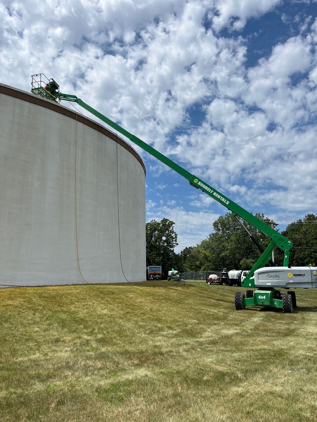 Water tank cleaning by Northern Power Washing LLC.
