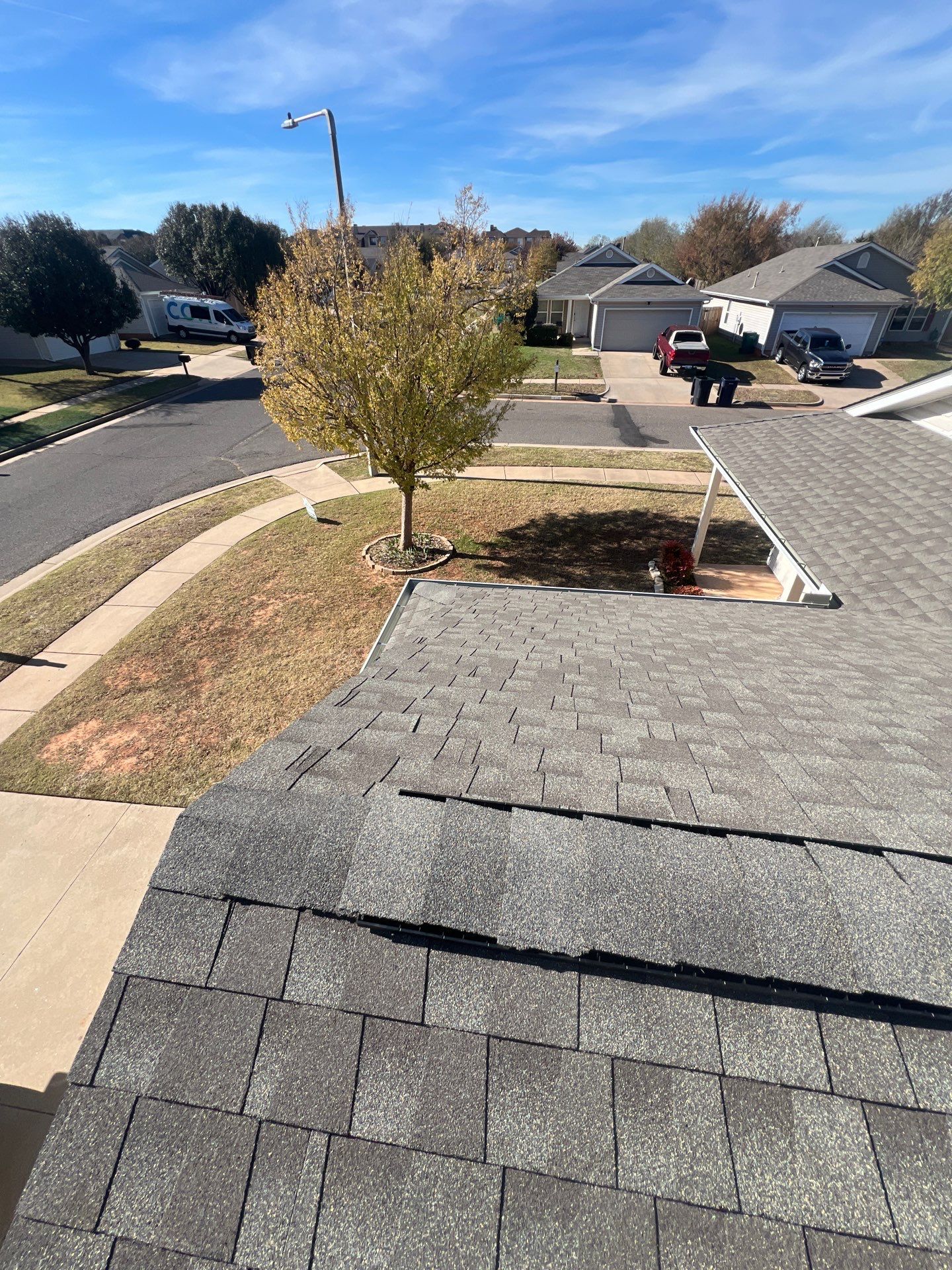 roof replacement & gutter installation in Edmond by McCann's Roofing and Construction