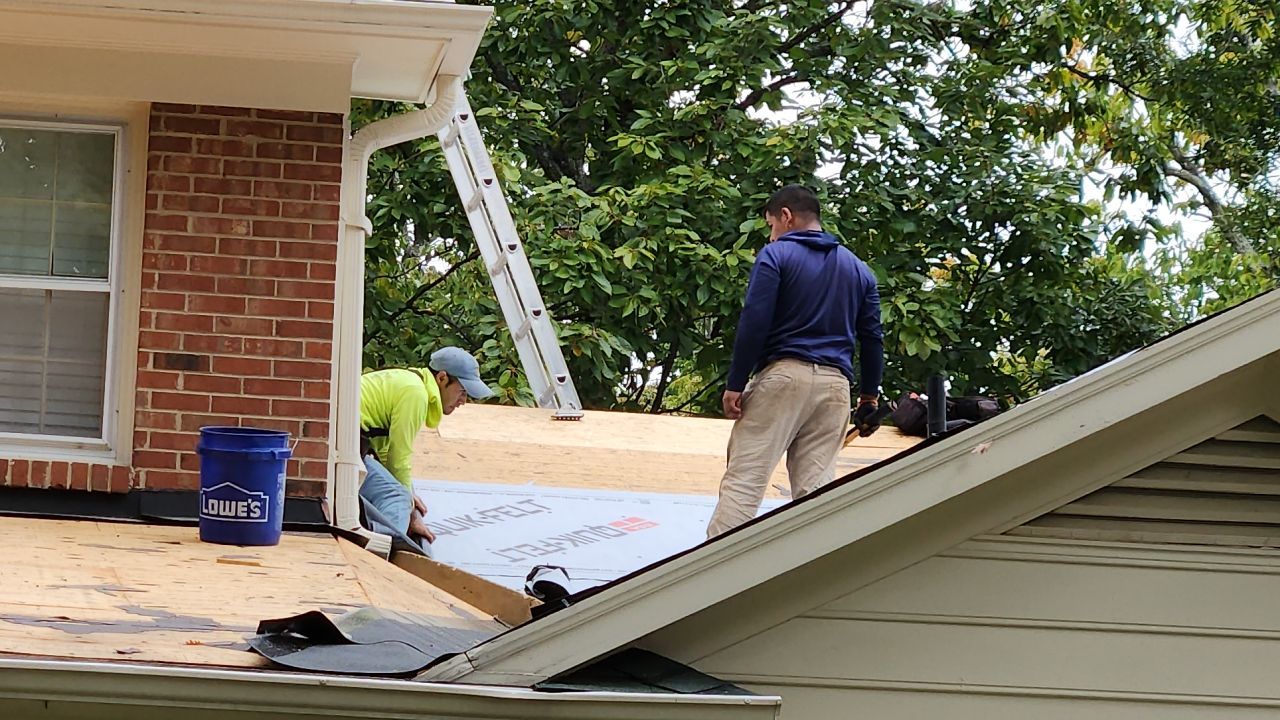 New Roof with Solar Panels by Just In Time Roofing and Restoration