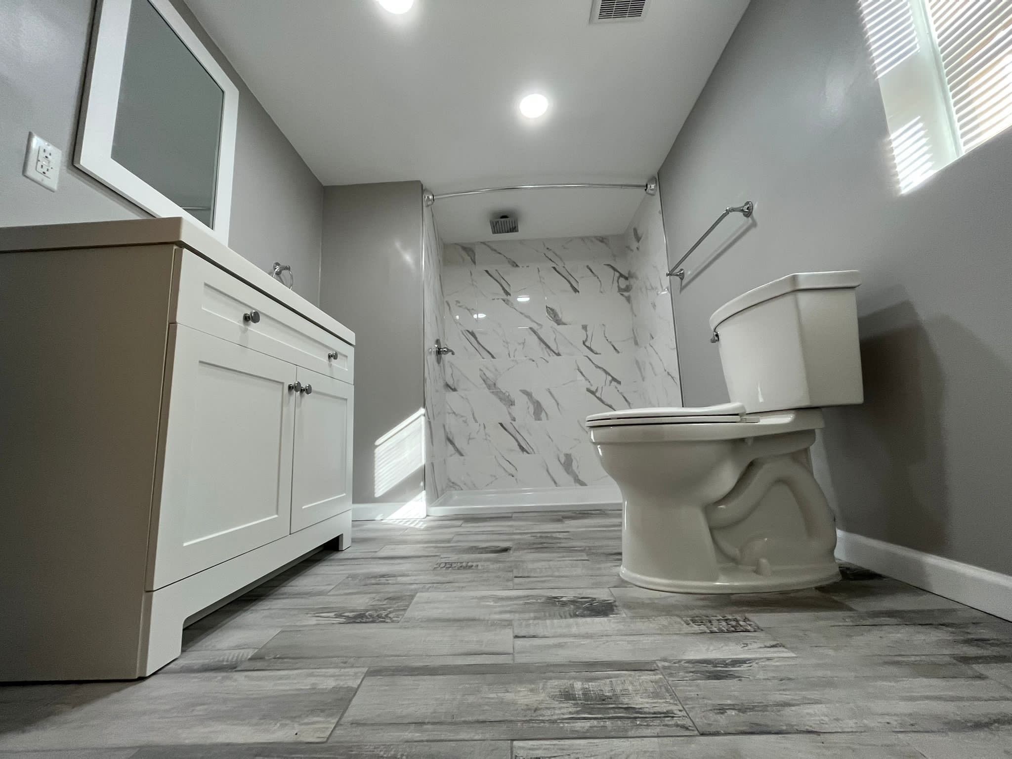 Bathroom Remodel using Tile by Home Concepts Construction