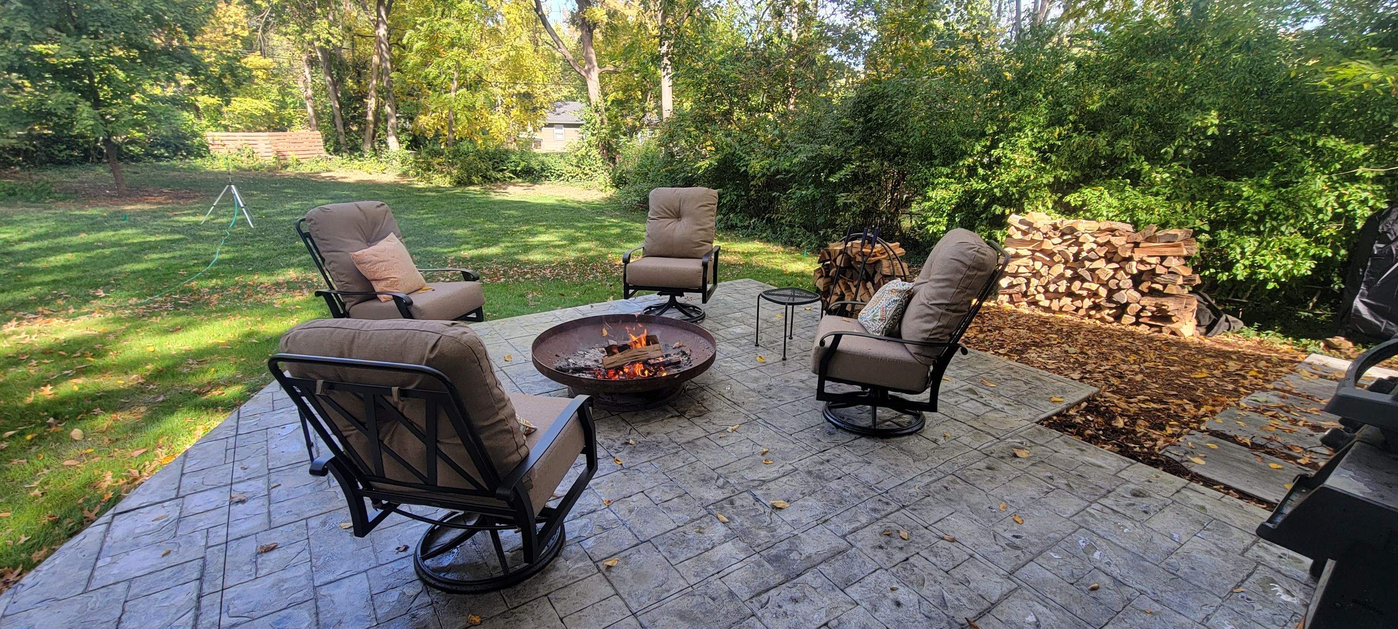 Back Yard Cantilivered Patio by LAND ESCAPES LLC