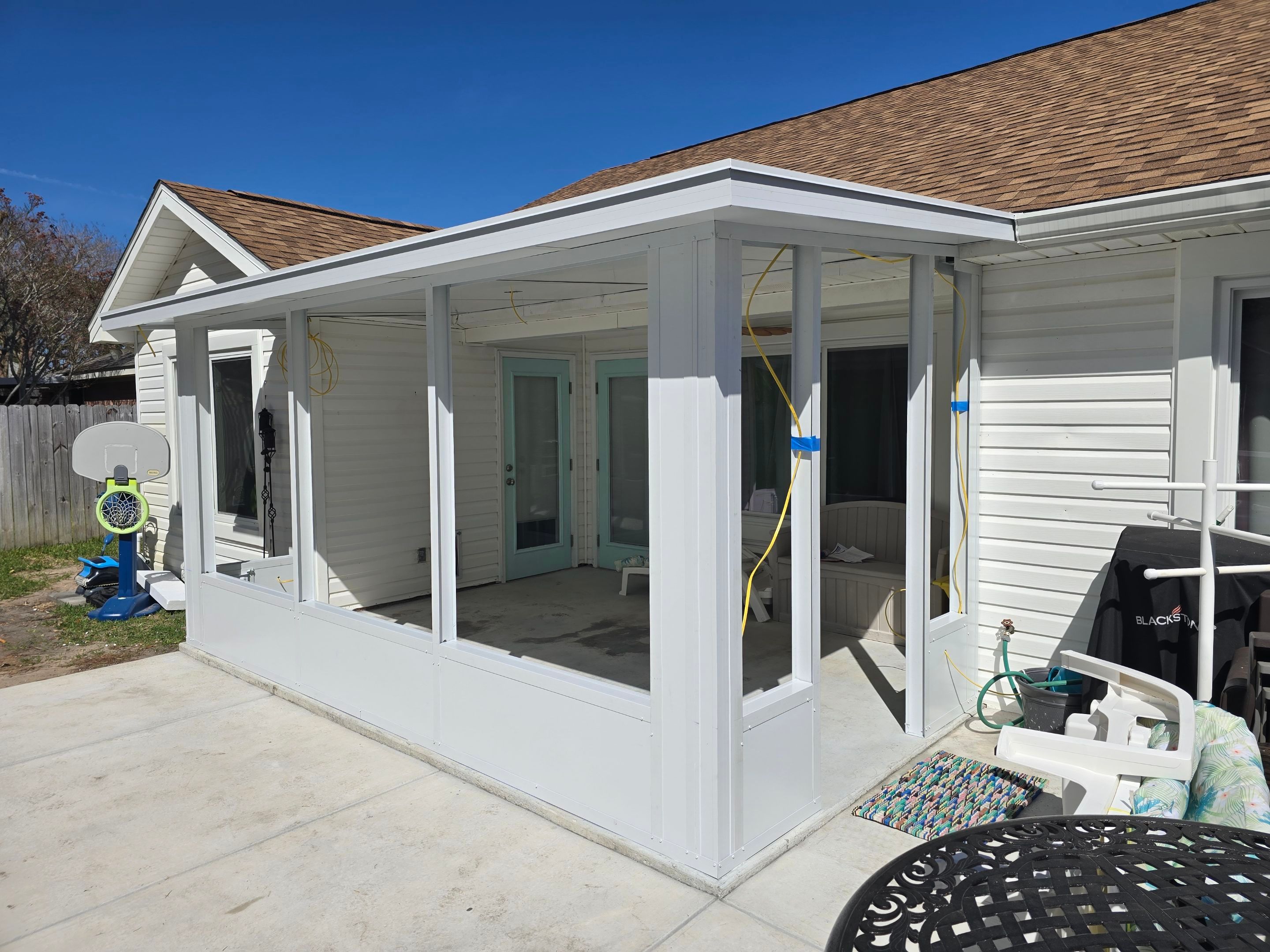 Poolside Glass Room in Gulf Breeze by Titan Sunrooms