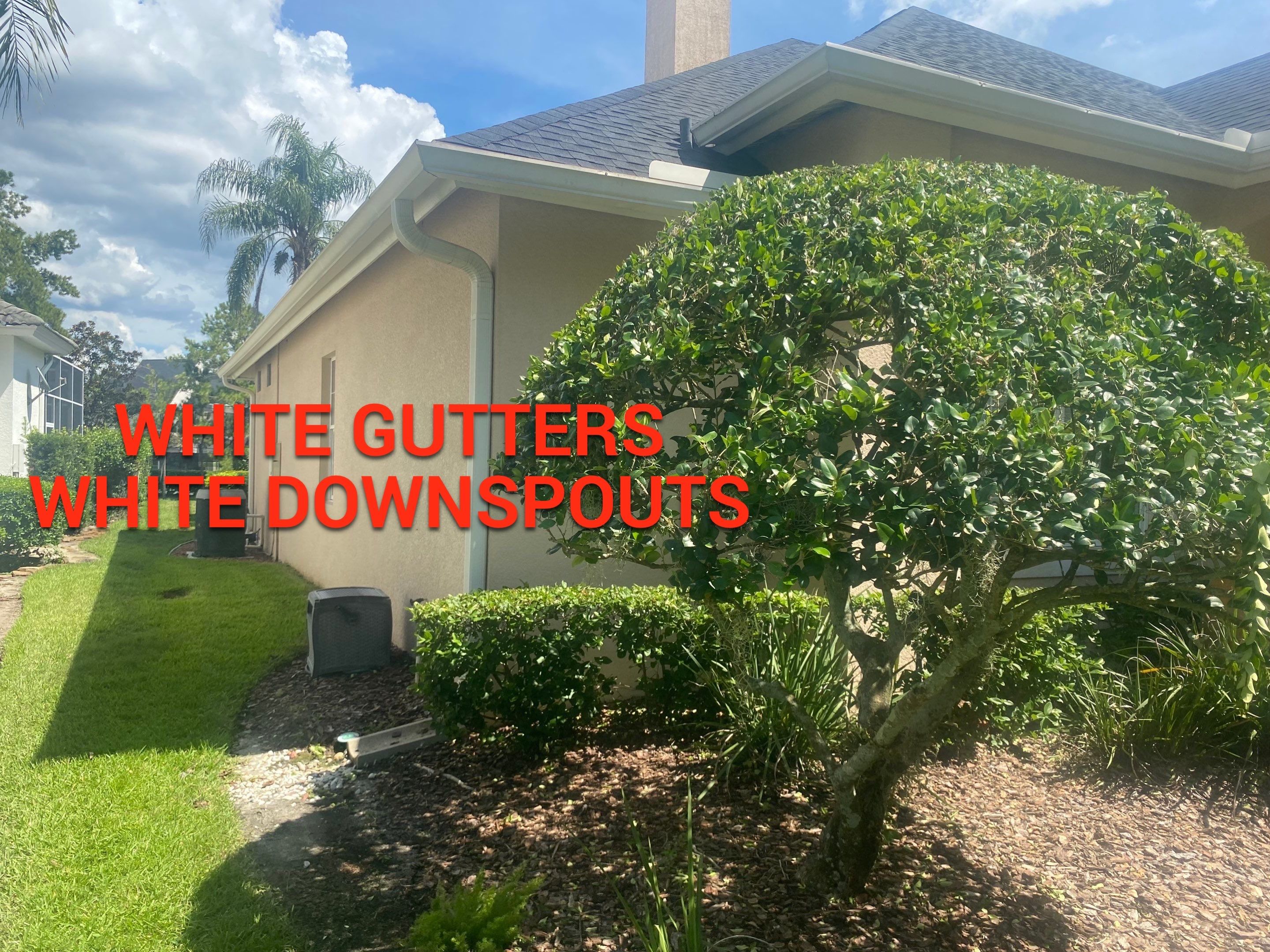 White Gutters and White Downspouts by Gutter Professors