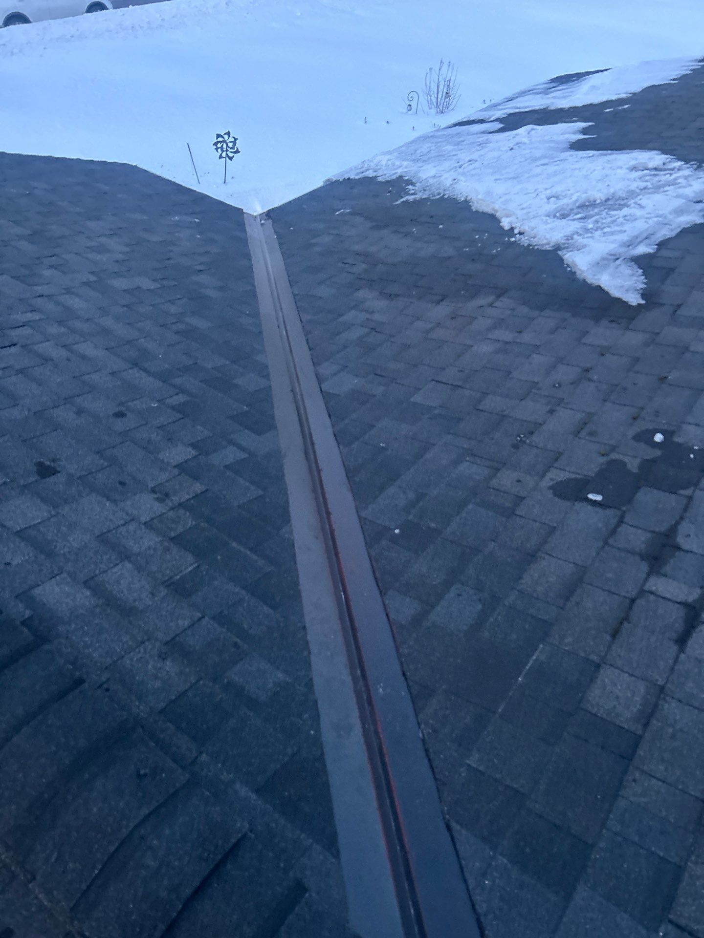Ridge Cap Replacement & Black Metal Valley Installation in Chelmsford, MA by Mighty Dog Roofing of Greater Middlesex County