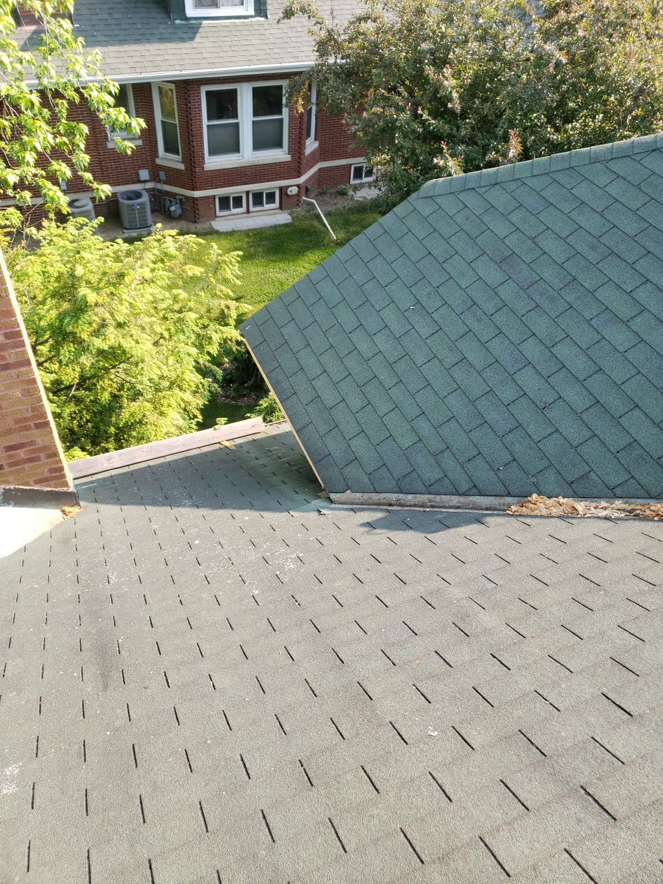 Asphalt Shingle Replacement and Half Round Copper Gutters Installation by Custom Installations, Inc.