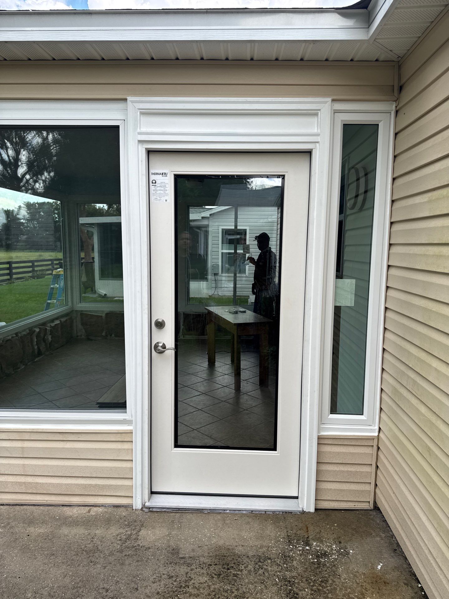 Sunroom Conversion with Alside Windows and Provia Door in The Villages by Windows & Doors Store