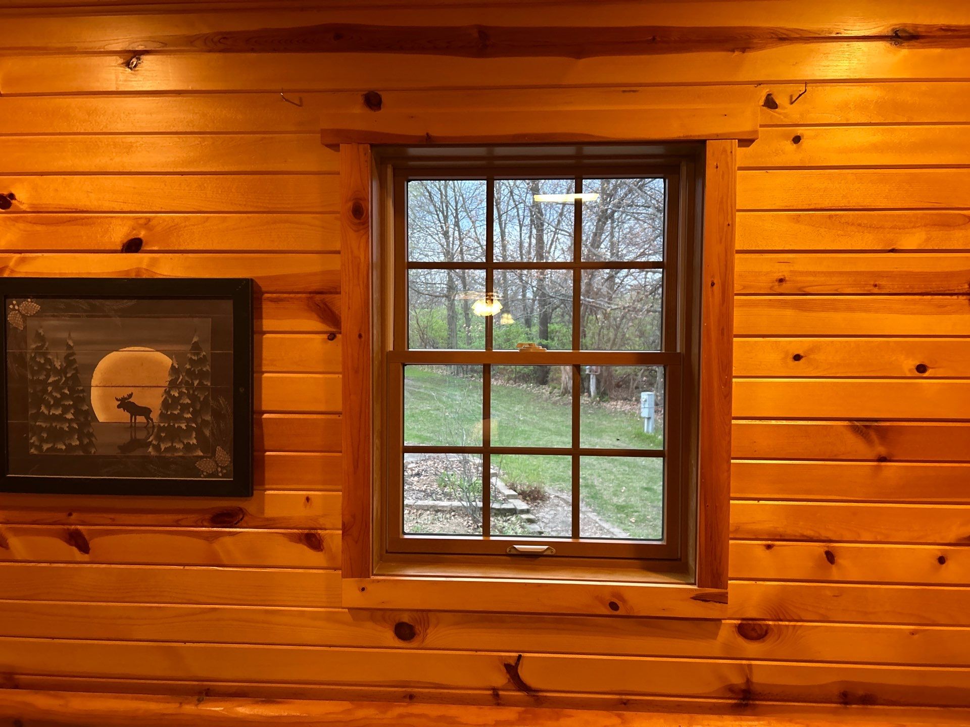 Pella Window installation using Pella Lifestyle wood/Aluminum window by United Windows and Siding LLC
