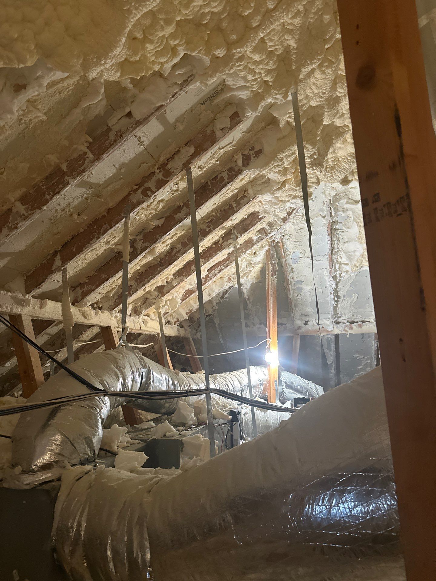 Spray foam insulation removal & re spray by Apex Insulation Solutions