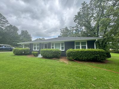 Social Circle Masonry Transformation with Dark Charcoal Exterior Painting