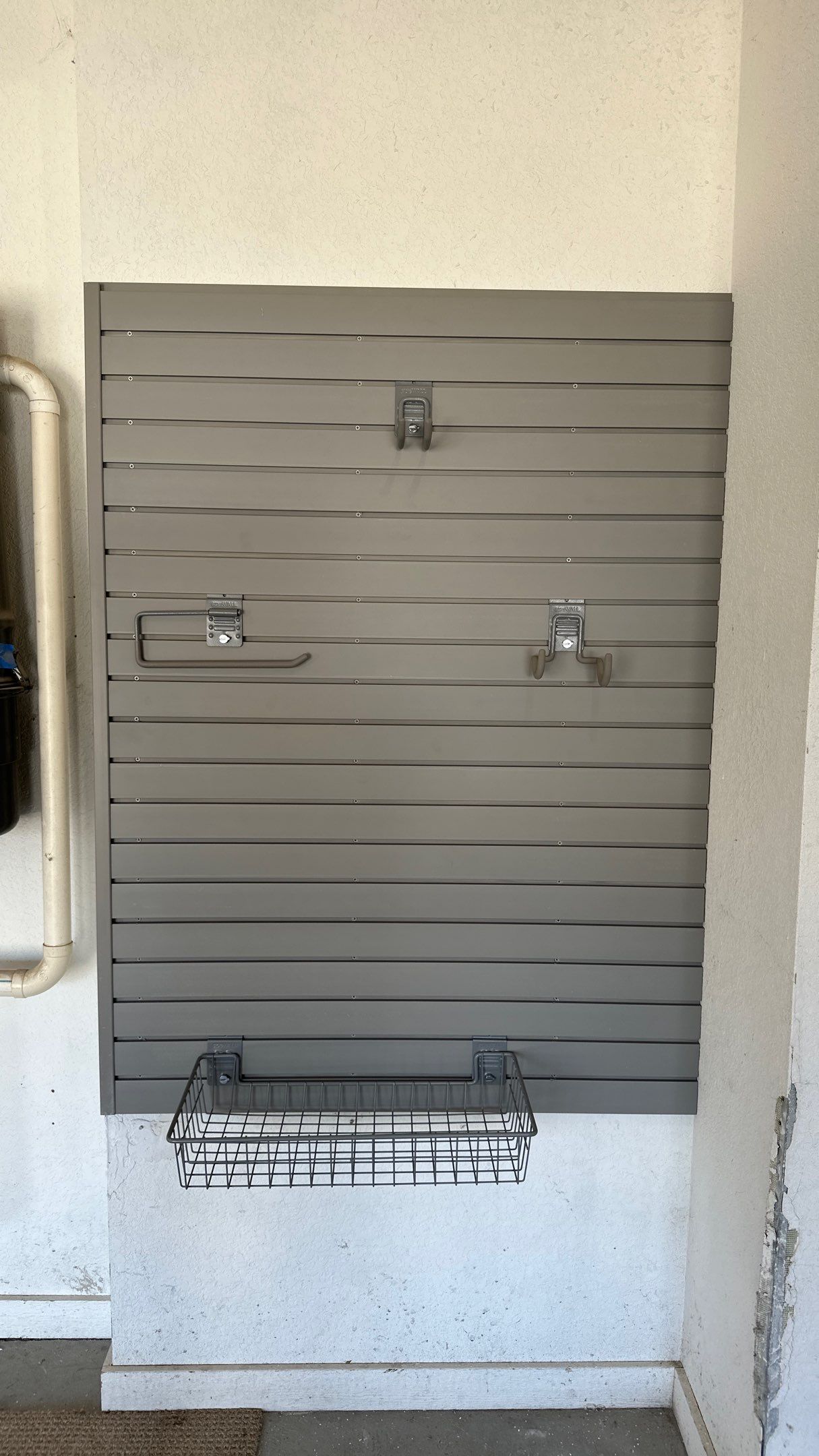 Melissa L. upgraded her garage with slatwall and overhead racks by Banner Garage
