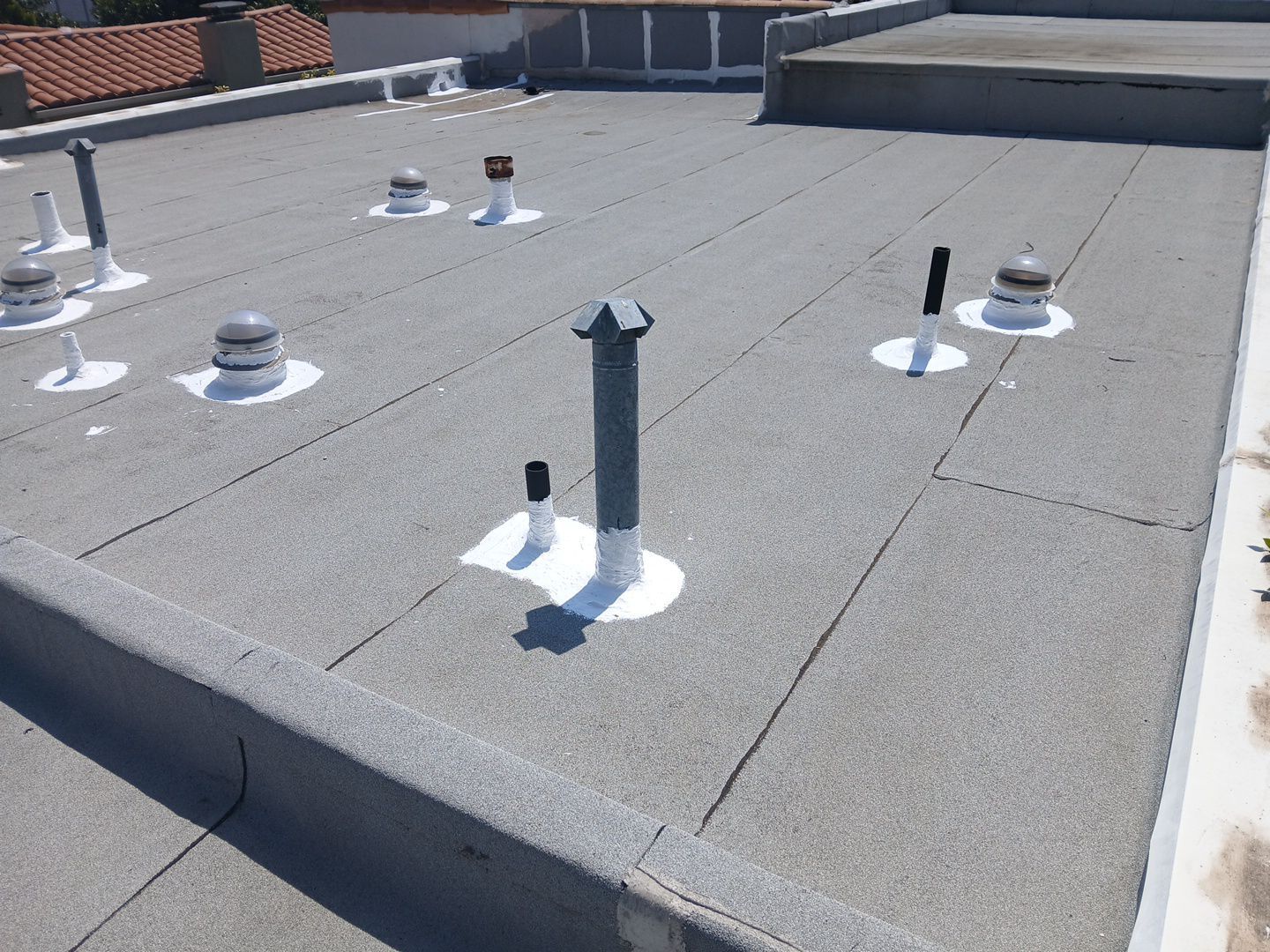 Silicone Membrane Installation using American Standard Coatings Silicone-S by Hull Brothers Roofing