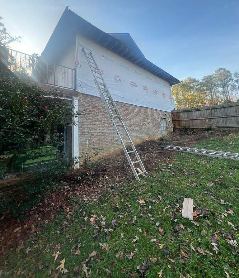Siding, Gutter, and Replacement with Exterior Painting on 1974 Built Home in Roswell, GA by Nelson Exteriors 