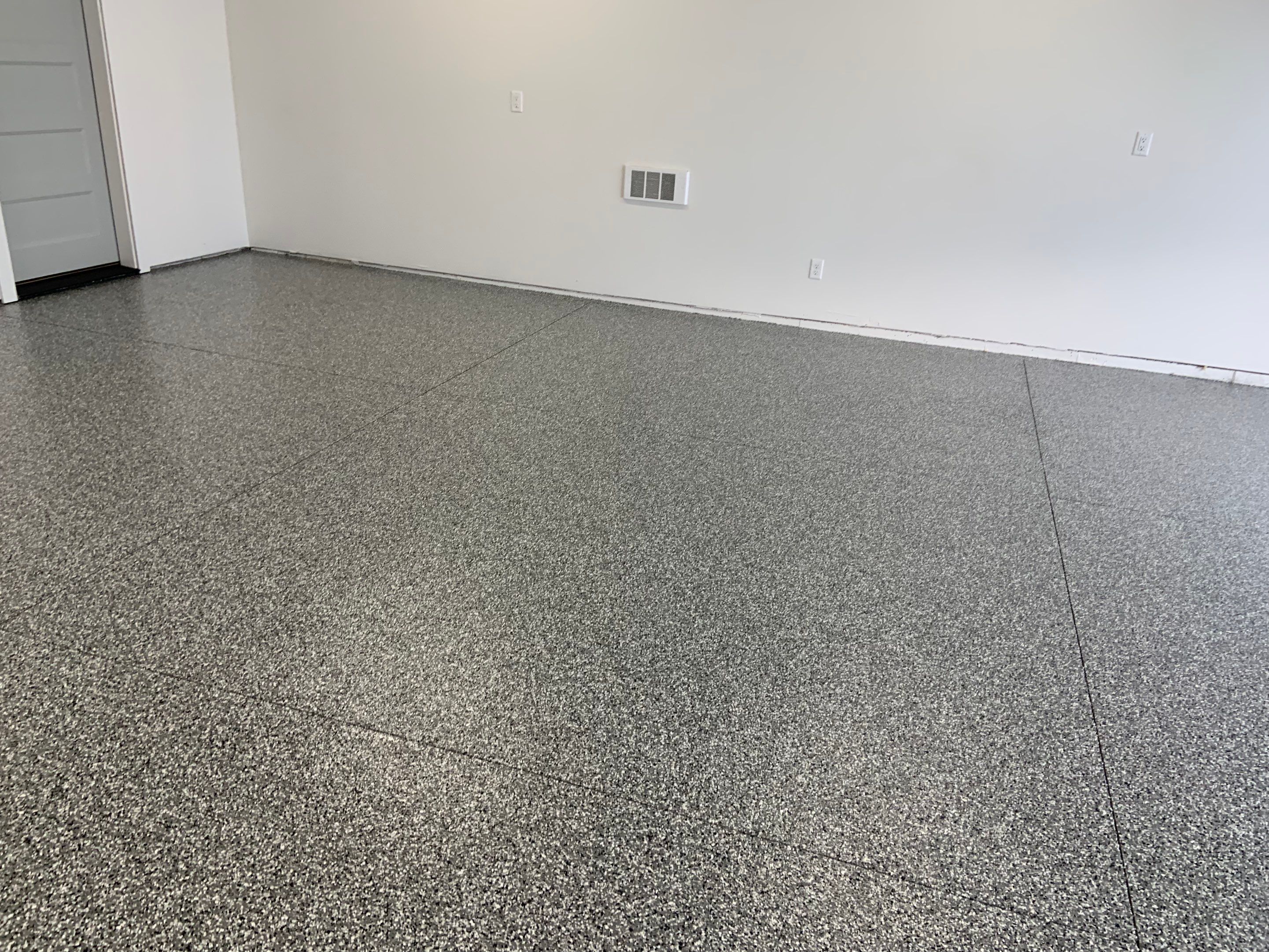 Garage Transformation using Smoke by Croc Coatings, LLC