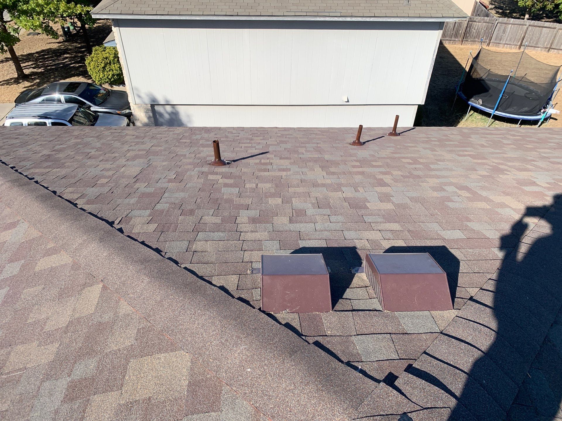 Asphalt Shingle Roof Replacement and Hail Damage Restoration in Hutto by Caliber Restoration LLC