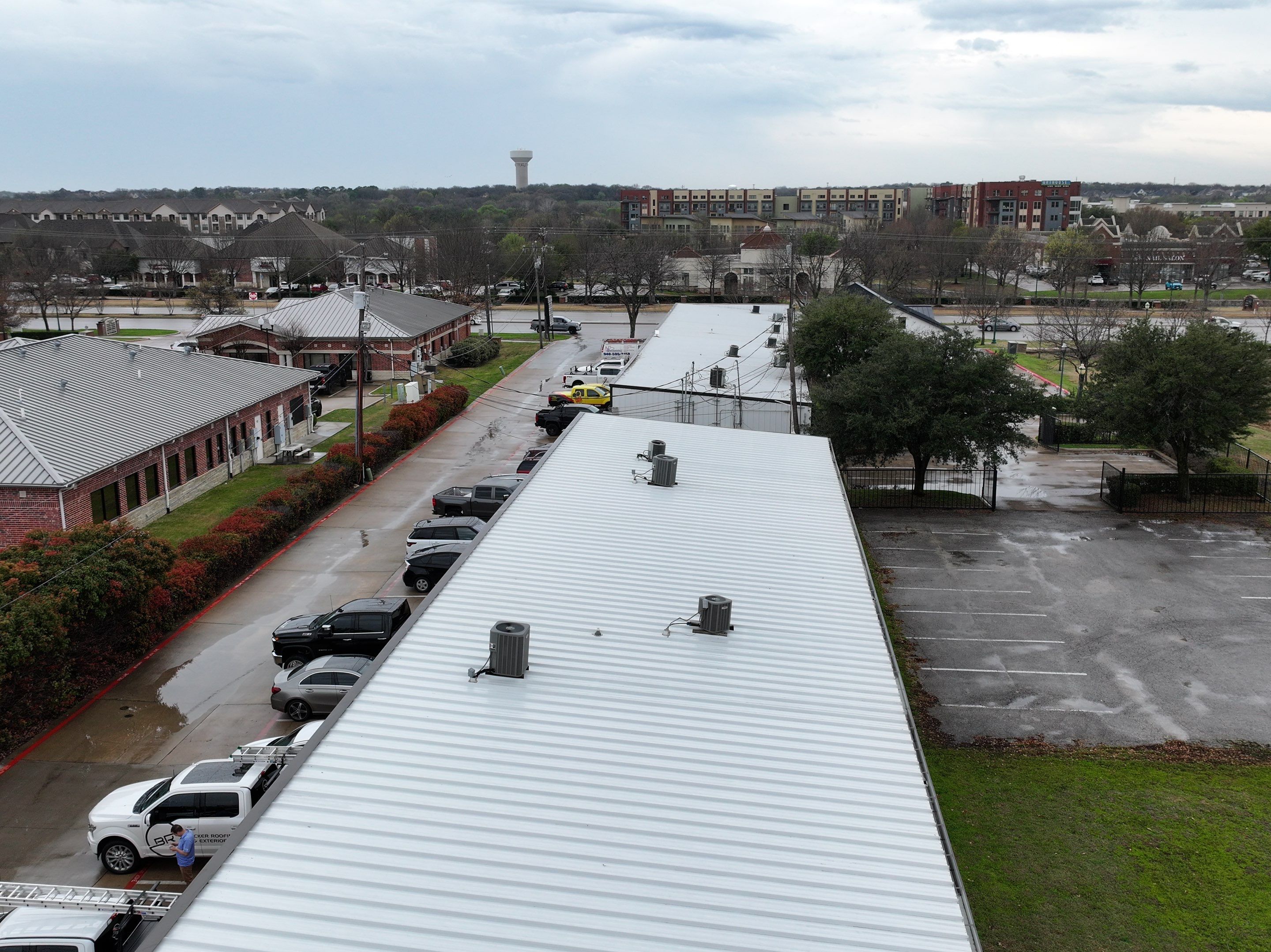 Commercial Roofing Installation using Double lock Mechanical Standing Seam Metal by Becker Roofing and Exteriors