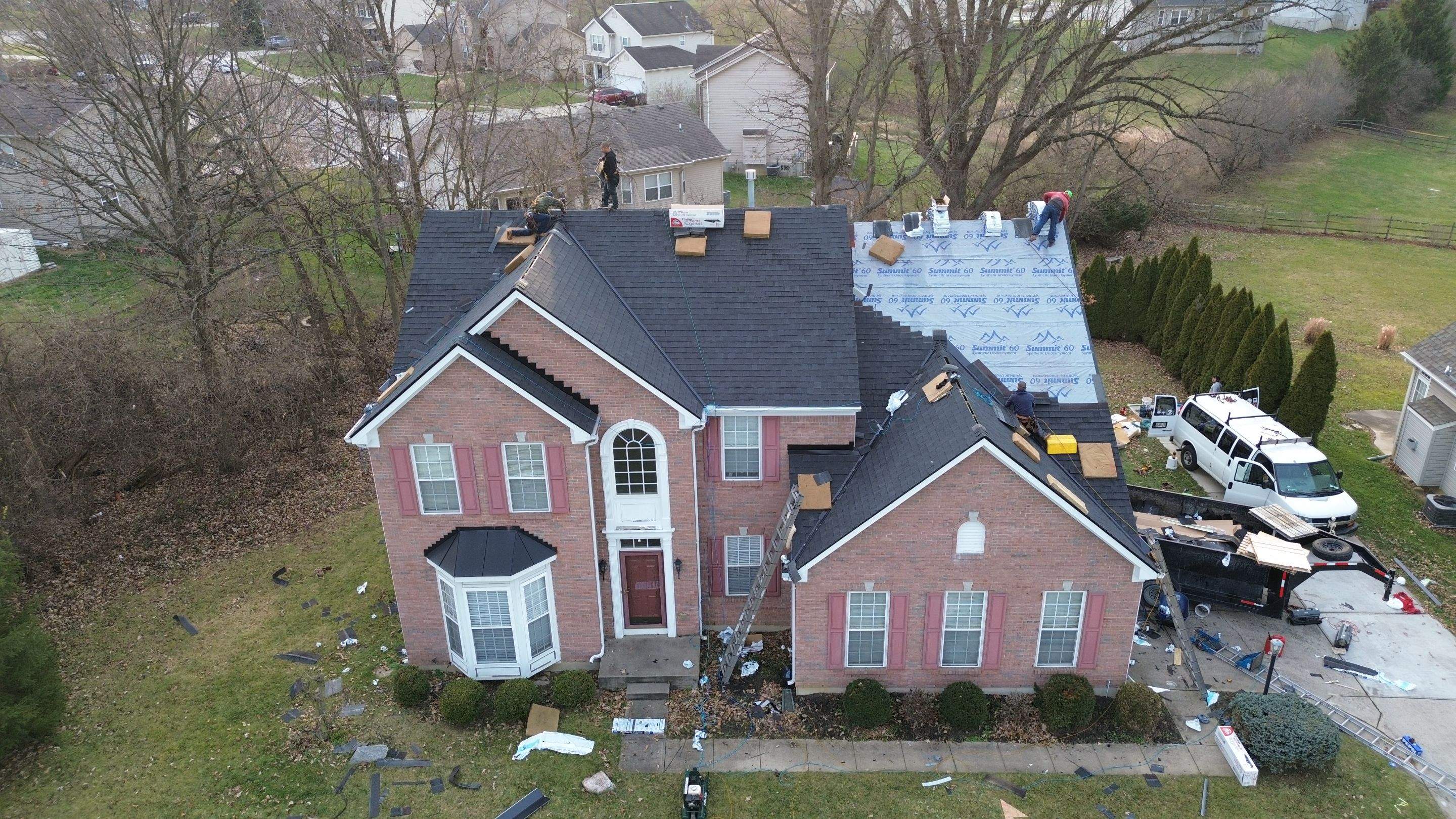 Walden Ponds - Pristine Black and Hydro Flo Gutter Guards by Tamlin Roofing