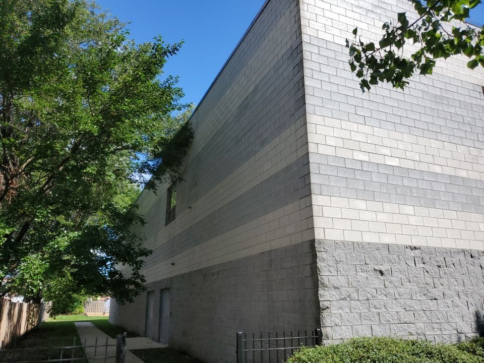 commercial pressure washing using Algaecide, soft wash soap by Northern Power Washing LLC.
