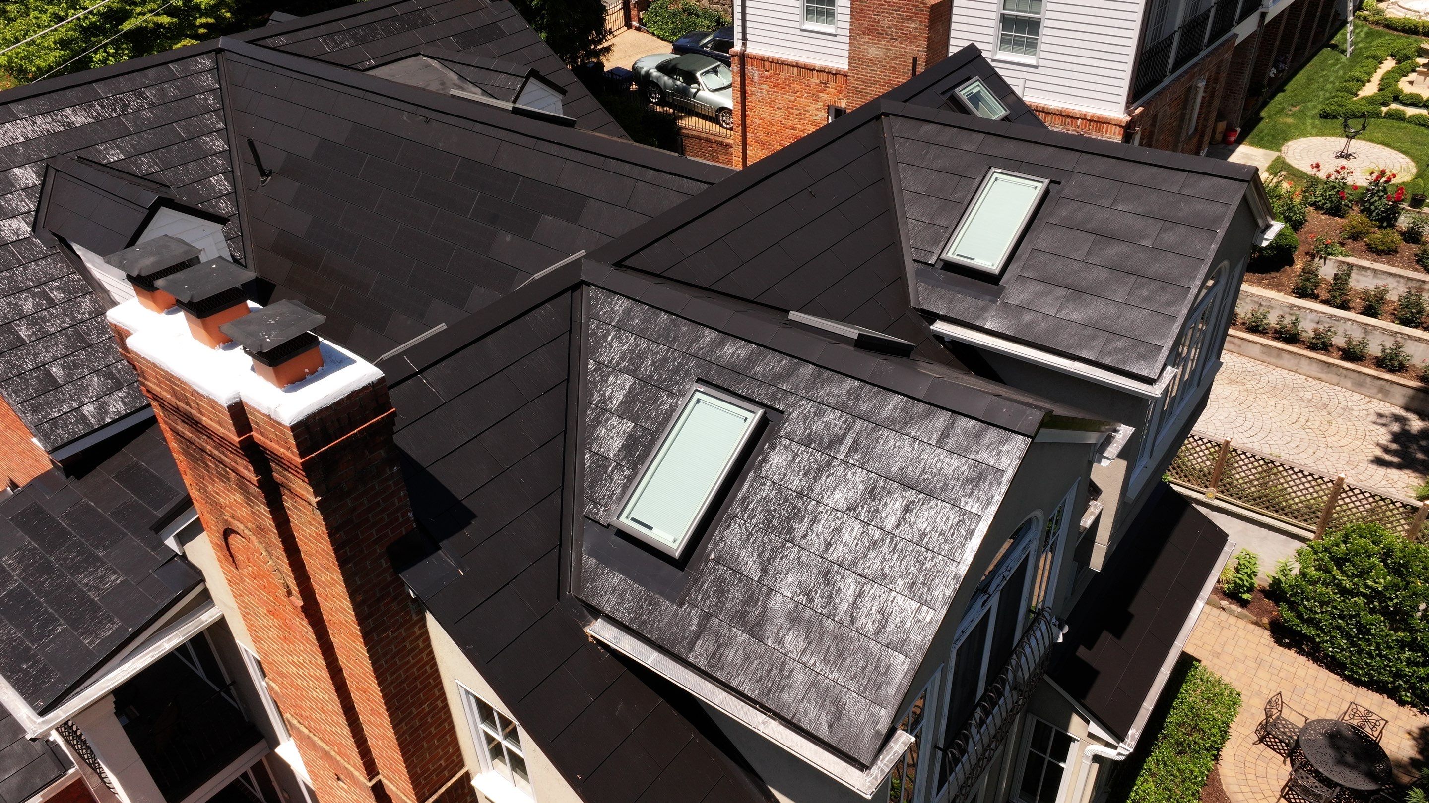 Sleek Tesla Solar Roof + Powerwall Installation | Alexandria, VA by American Home Contractors