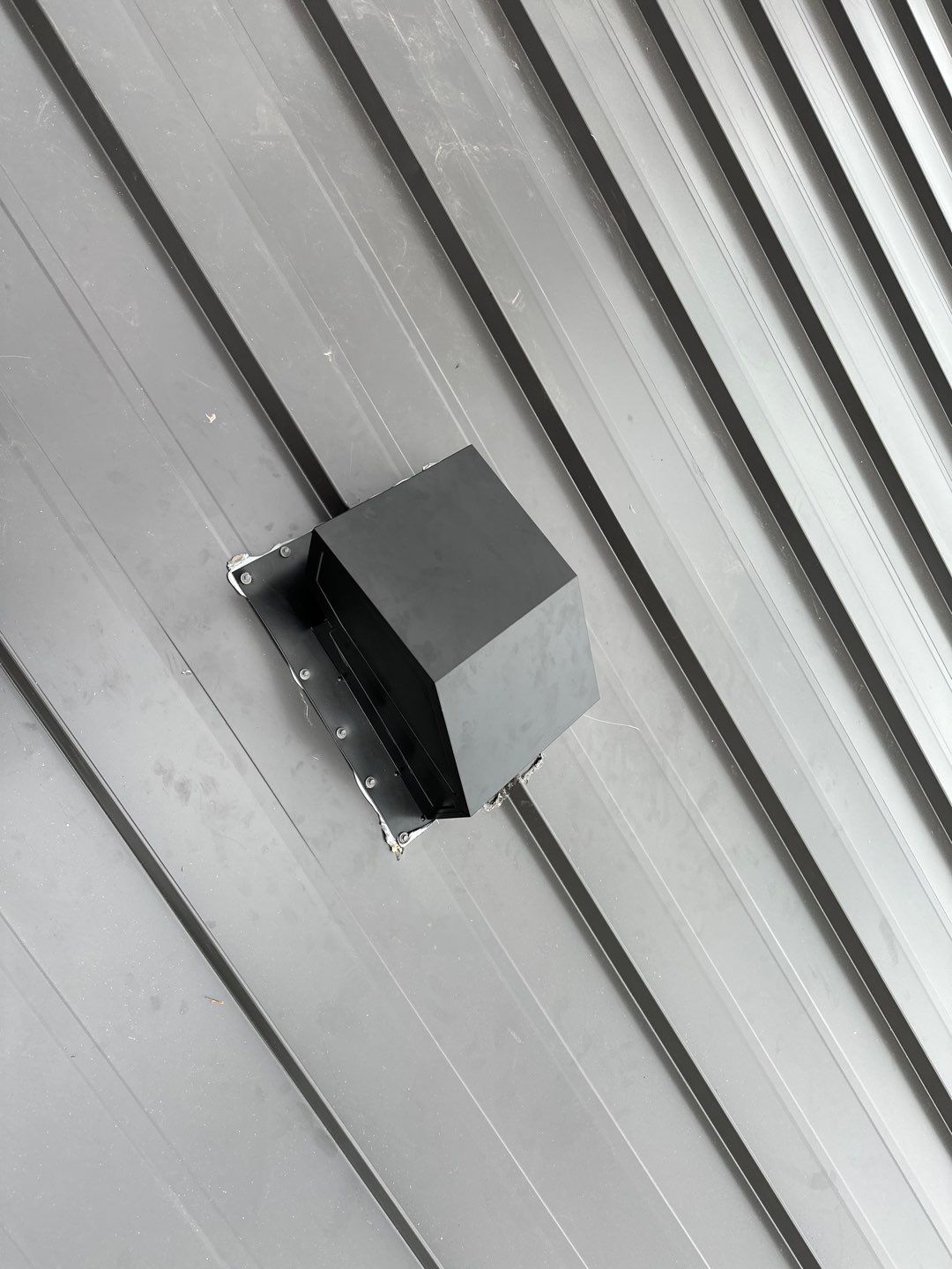 Residential Roofing Installation using Standing Seam Metal by Undersun Roofing 