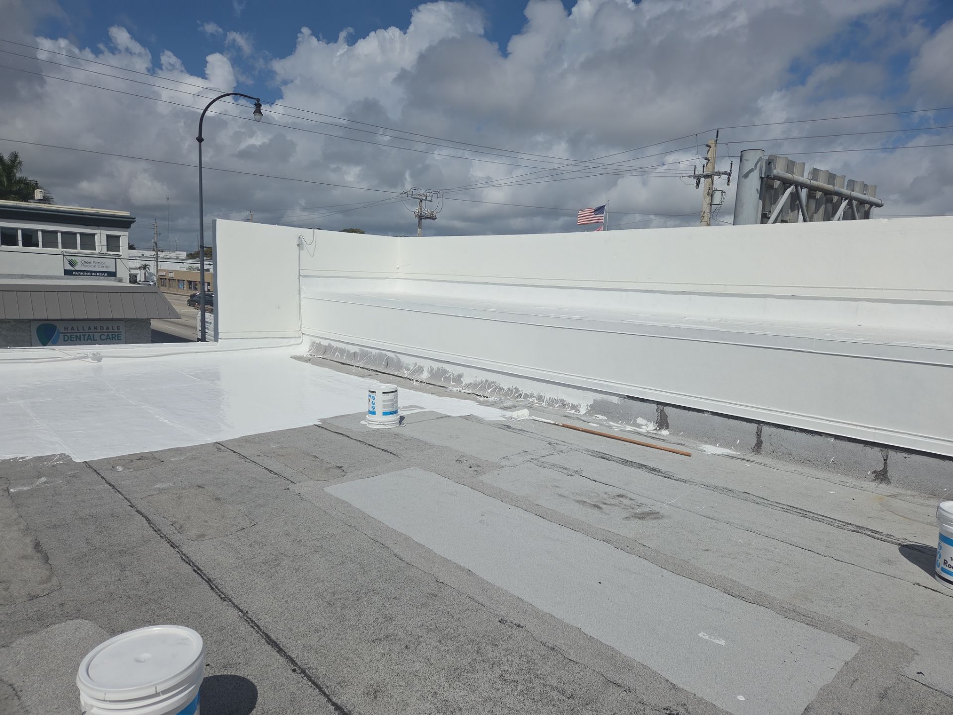 Commercial Flat Roof Restoration Using Silicone Coating in Hallandale Beach by Aastro Roofing