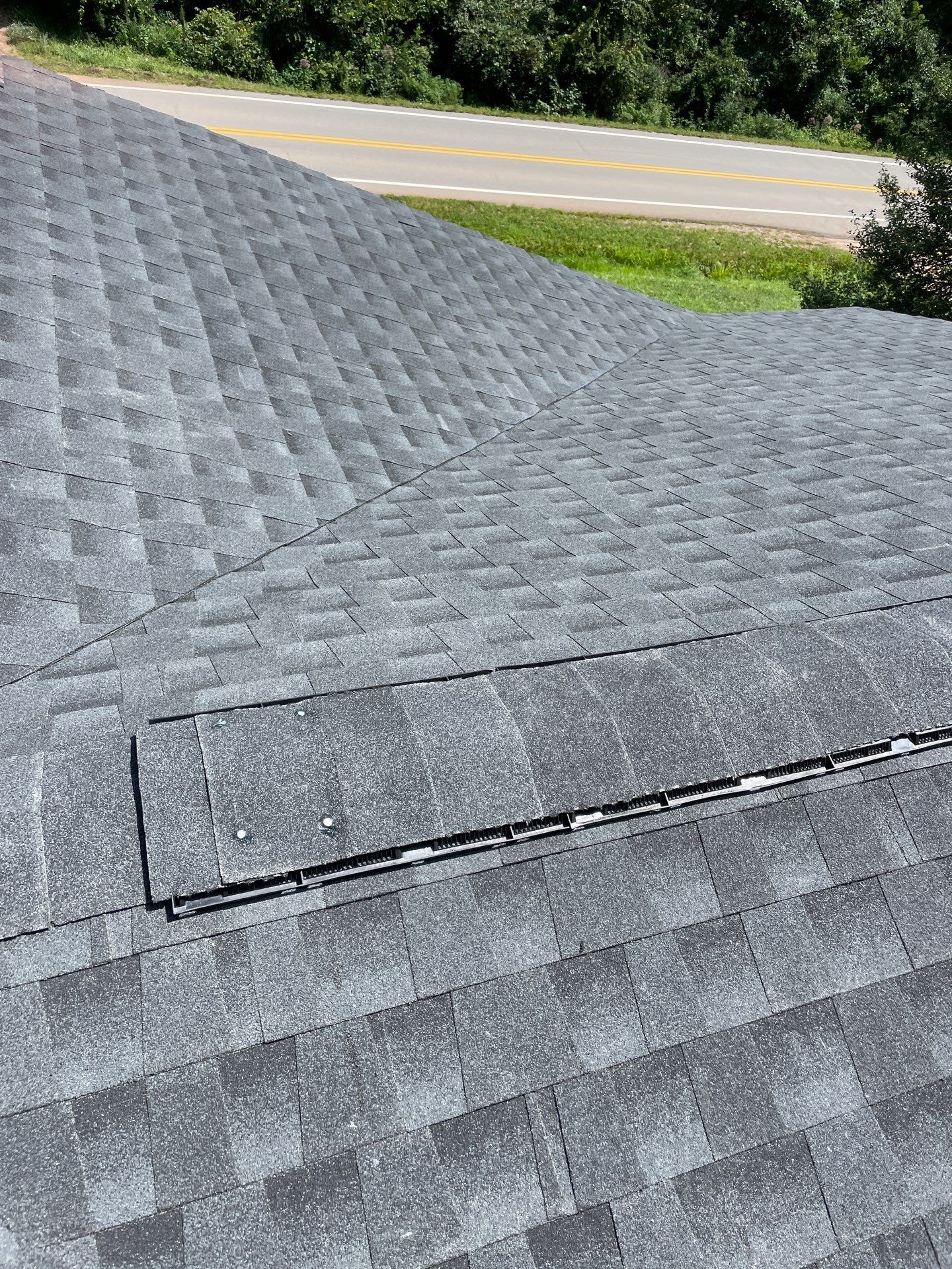 Residential Roofing Installation using GAF Timberline HDZ Charcoal by Rainstoppers Roofing