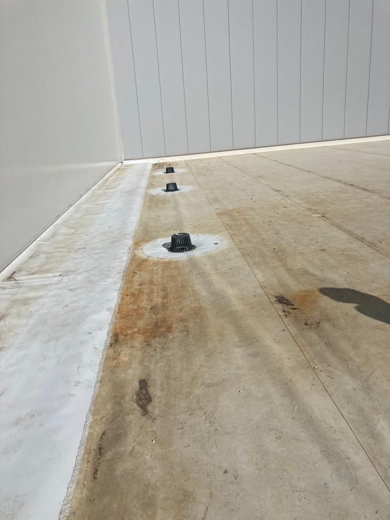 Drain Installation at CJ BIO by Grell Roofing, LLC
