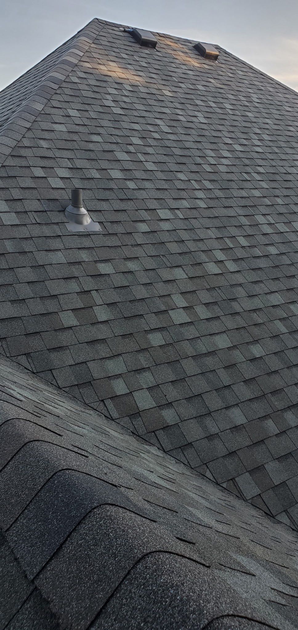 Storm Damaged Roof & Gutter Replacement by Eaton Roofing 