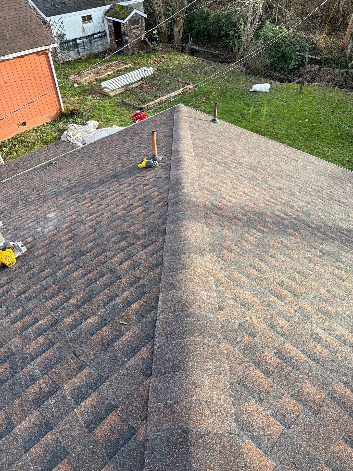 Residential Roofing Installation using GAF TImberline HDZ Hickory by Rainstoppers Roofing