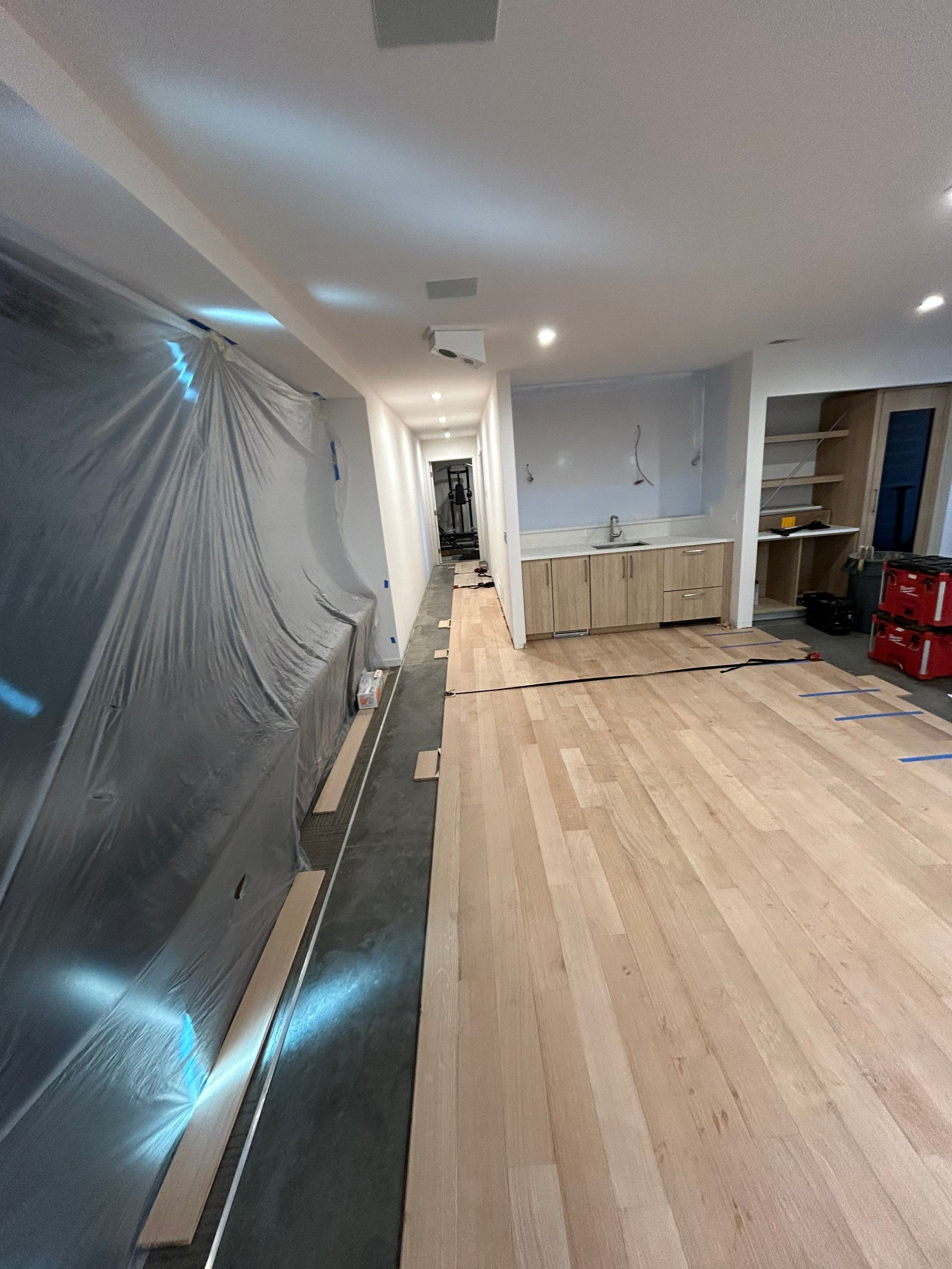 Basement Remodel using Engineered White Oak by RTBaldwin Hardwood Floors
