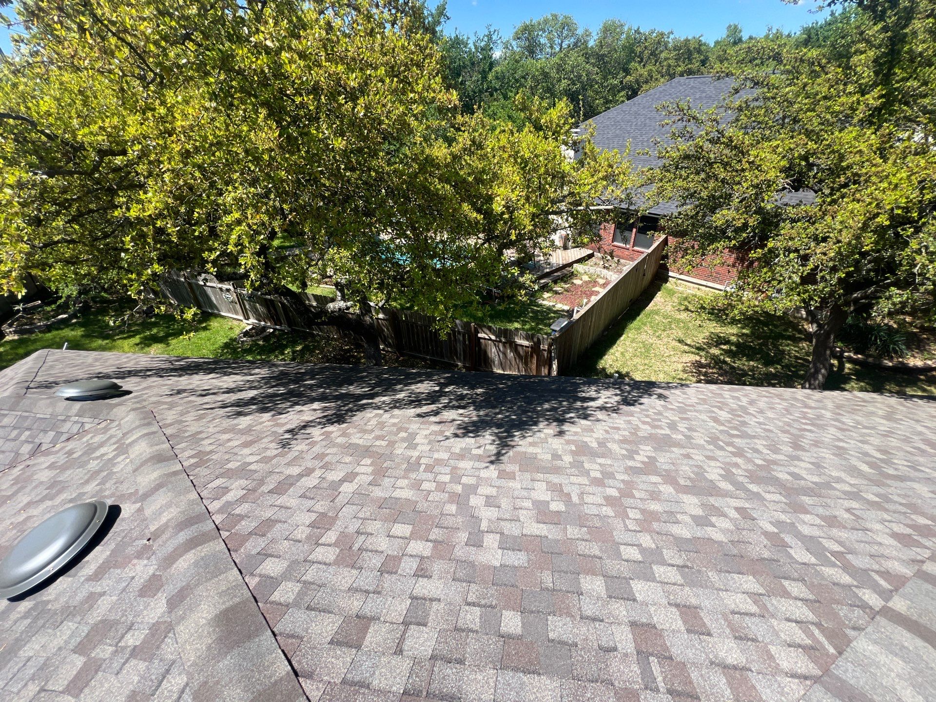 Rental property upgrade using CertainTeed Landmark shingles. by Oakwood Roofing and Construction, LLC