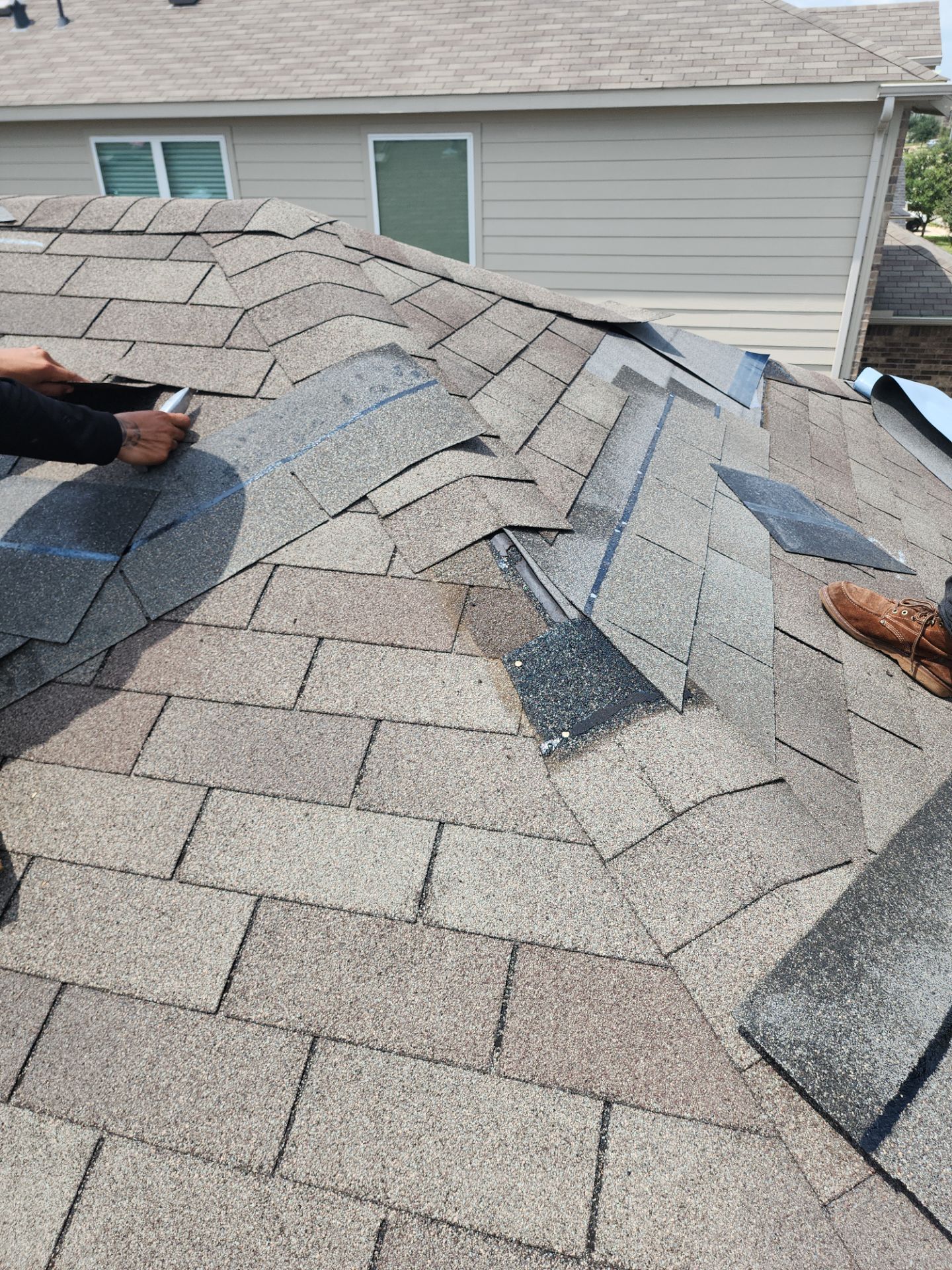 Hail Damage using Owen's Corning Duration (Lifetime) Shingles by Roof Repair Company