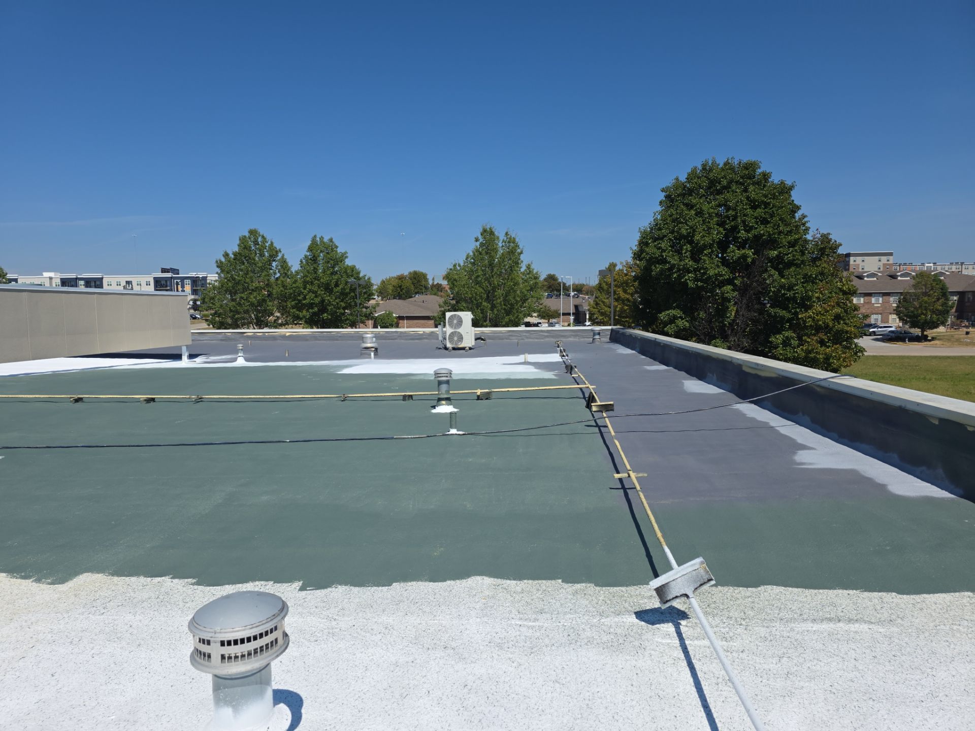 Commercial Roofing Install - SPF Foam & Coatings Restoration & EPDM System - Color White  by Titan Commercial & Residential Roofing 