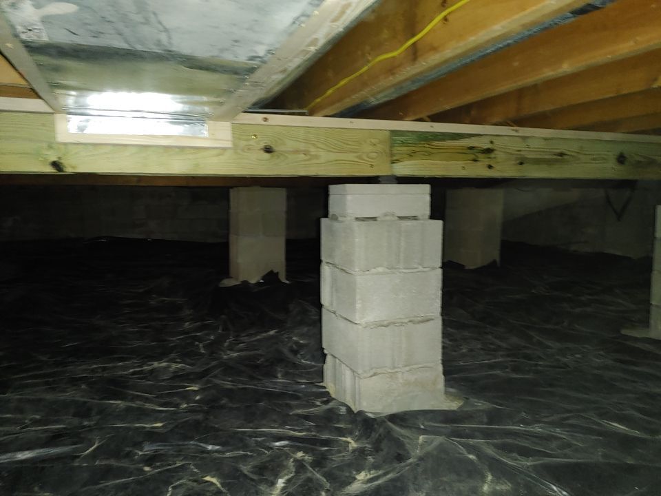Crawl space encapsulation and Waterproofing using Structural Wood and Steel Reinforcements by Toledo Basement Repair 