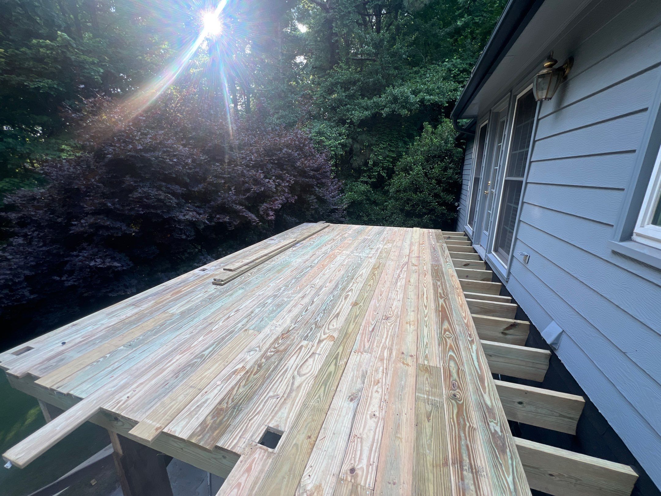 Pressure-Treated Wood Deck Replacement and Staircase Installation in Kennesaw by Swift Home Renovations