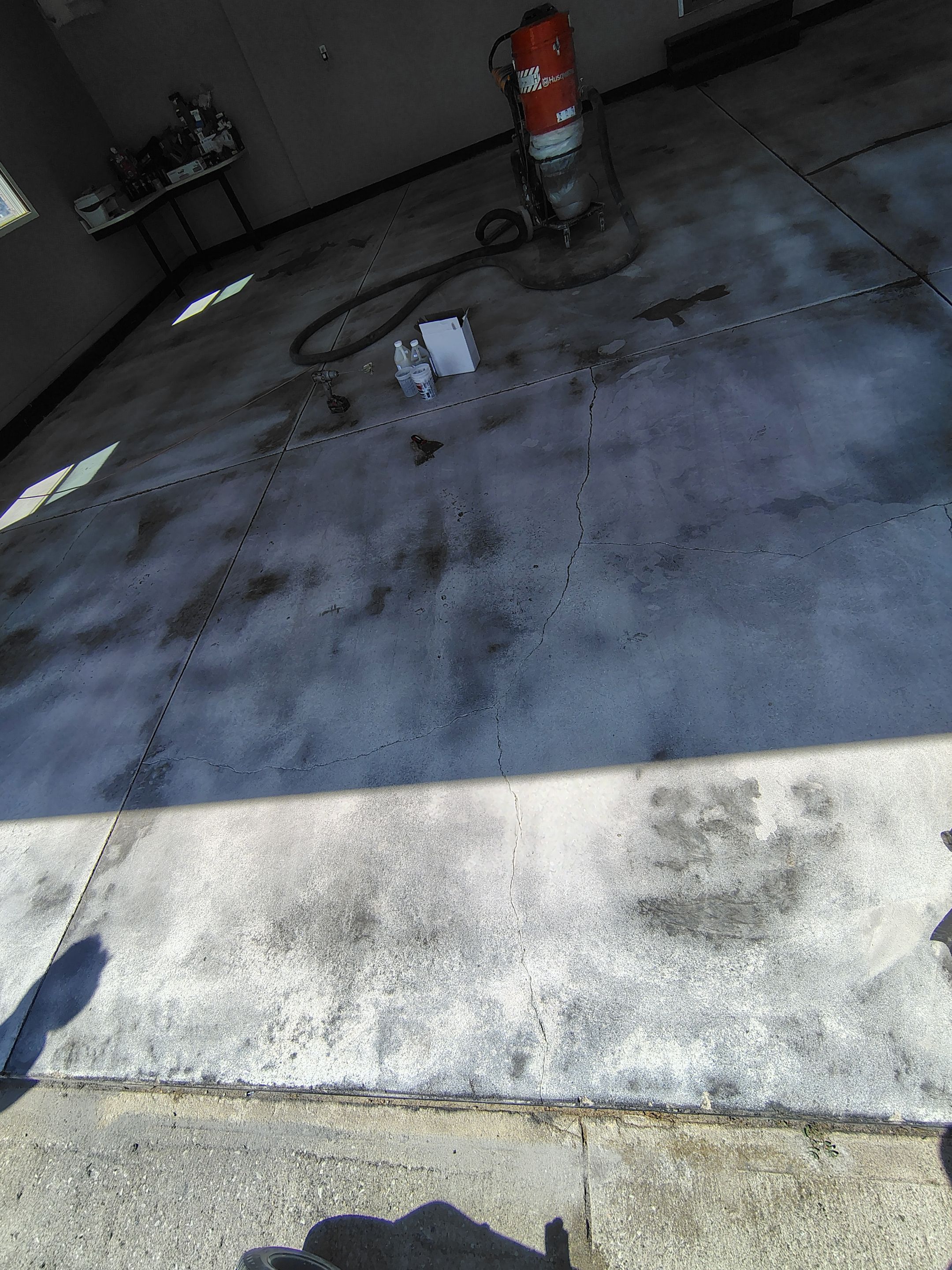 Garage Concrete Floor Coating and Crack Repair in Onawa by Select Painting, Coatings & Garage Cabinets