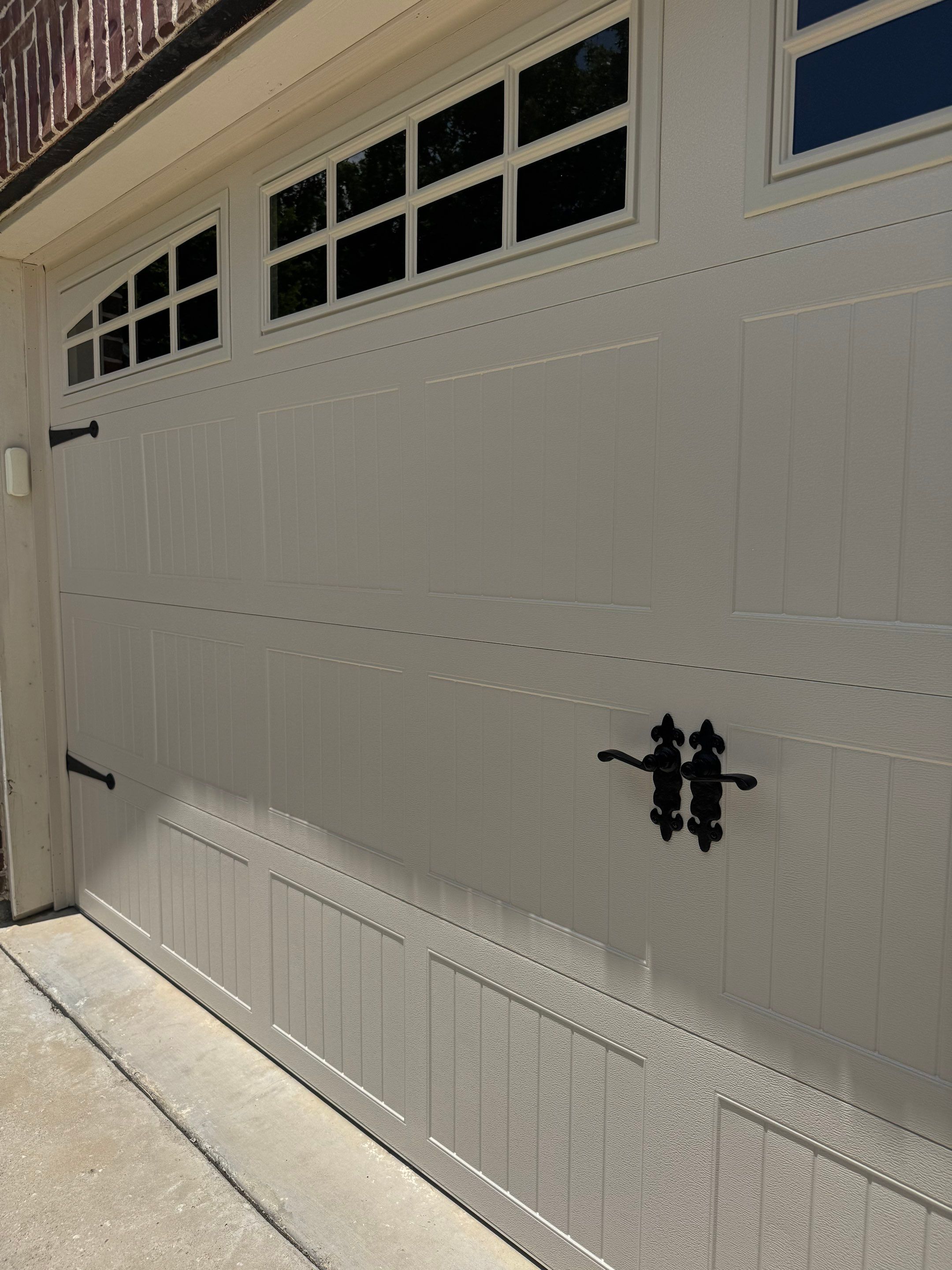 CHI Carriage Stamp Garage Door Installation With Decorative Hardware In Roanoke by Meadows Garage Doors
