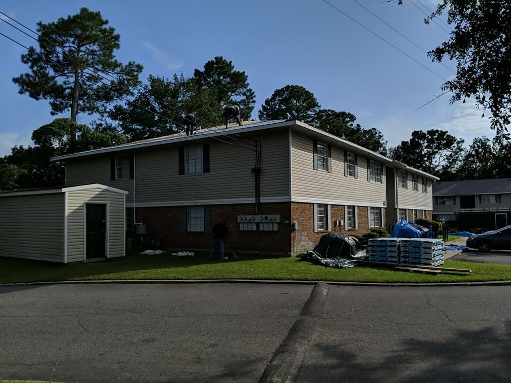 Residential Roofing Installation using Roof Replacement by American Roofing & Construction LLC