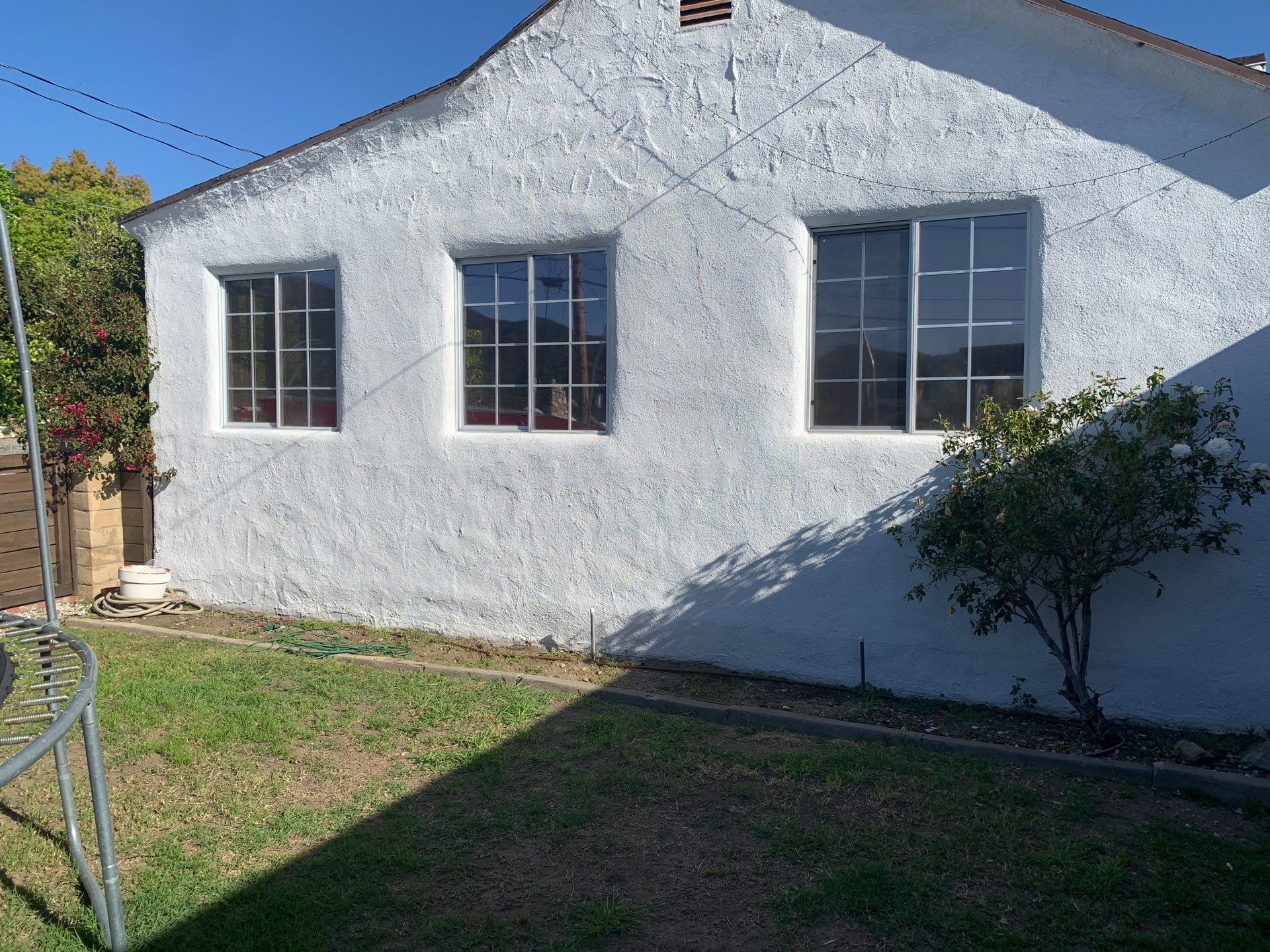 Window Installation using Black Anlin windows by American Window Company