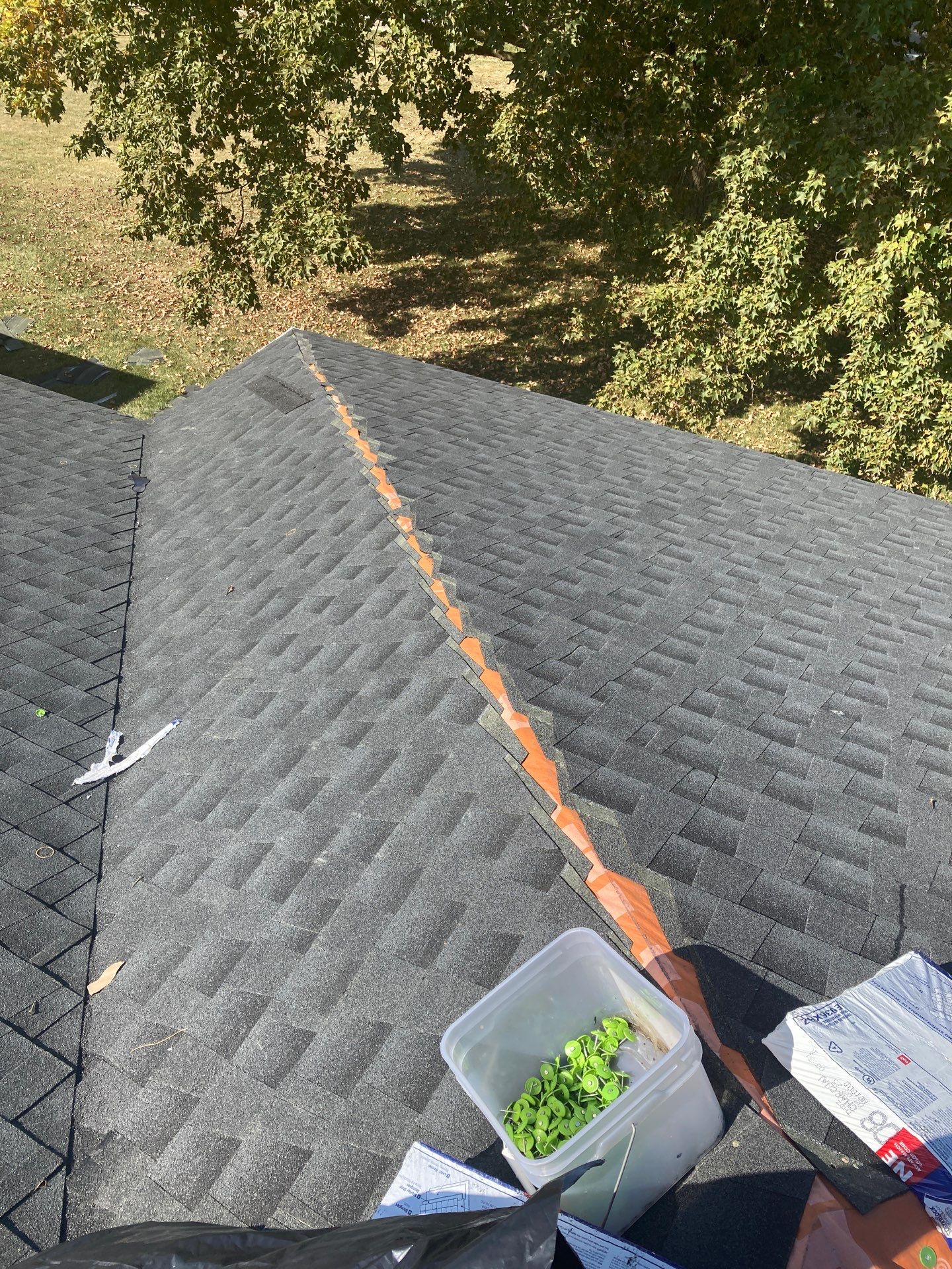 Residential Roofing Installation using GAF Timberline HDZ Charcoal by Rainstoppers Roofing