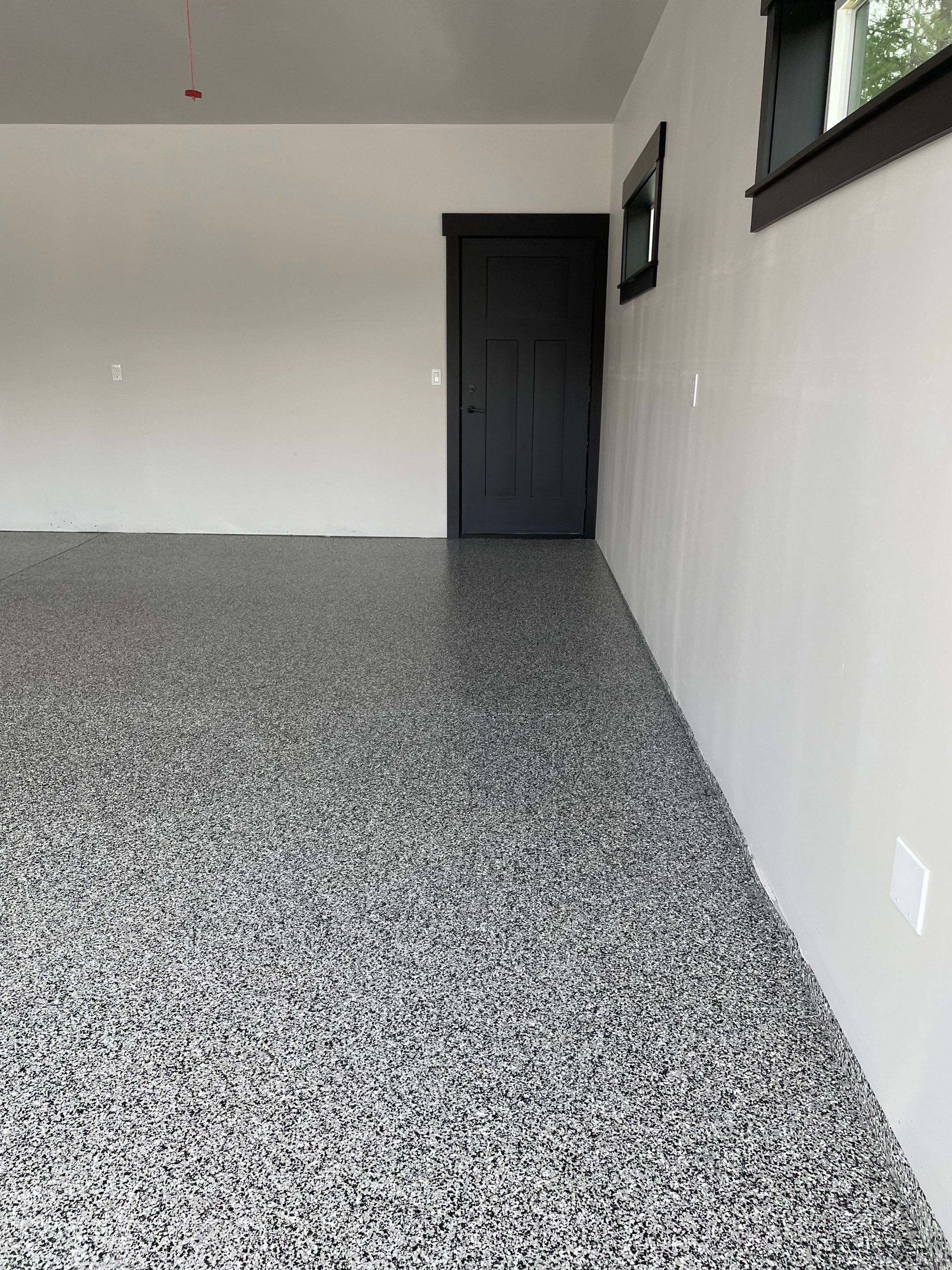 Garage Transformation using Domino and The Penntek Evolution System by Croc Coatings, LLC