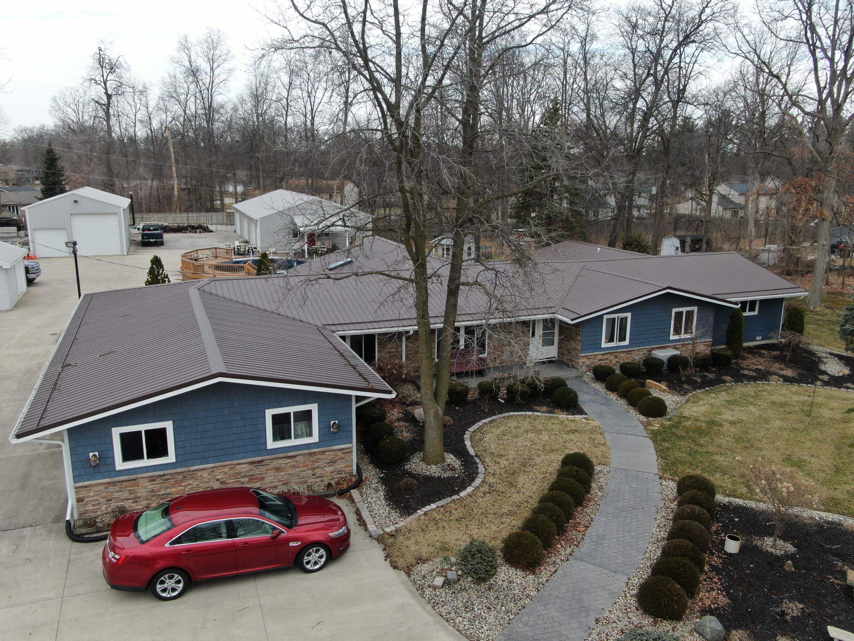 Residential Roofing Installation using Exposed Fastener Metal Roof by 4Ever Metal Roofing