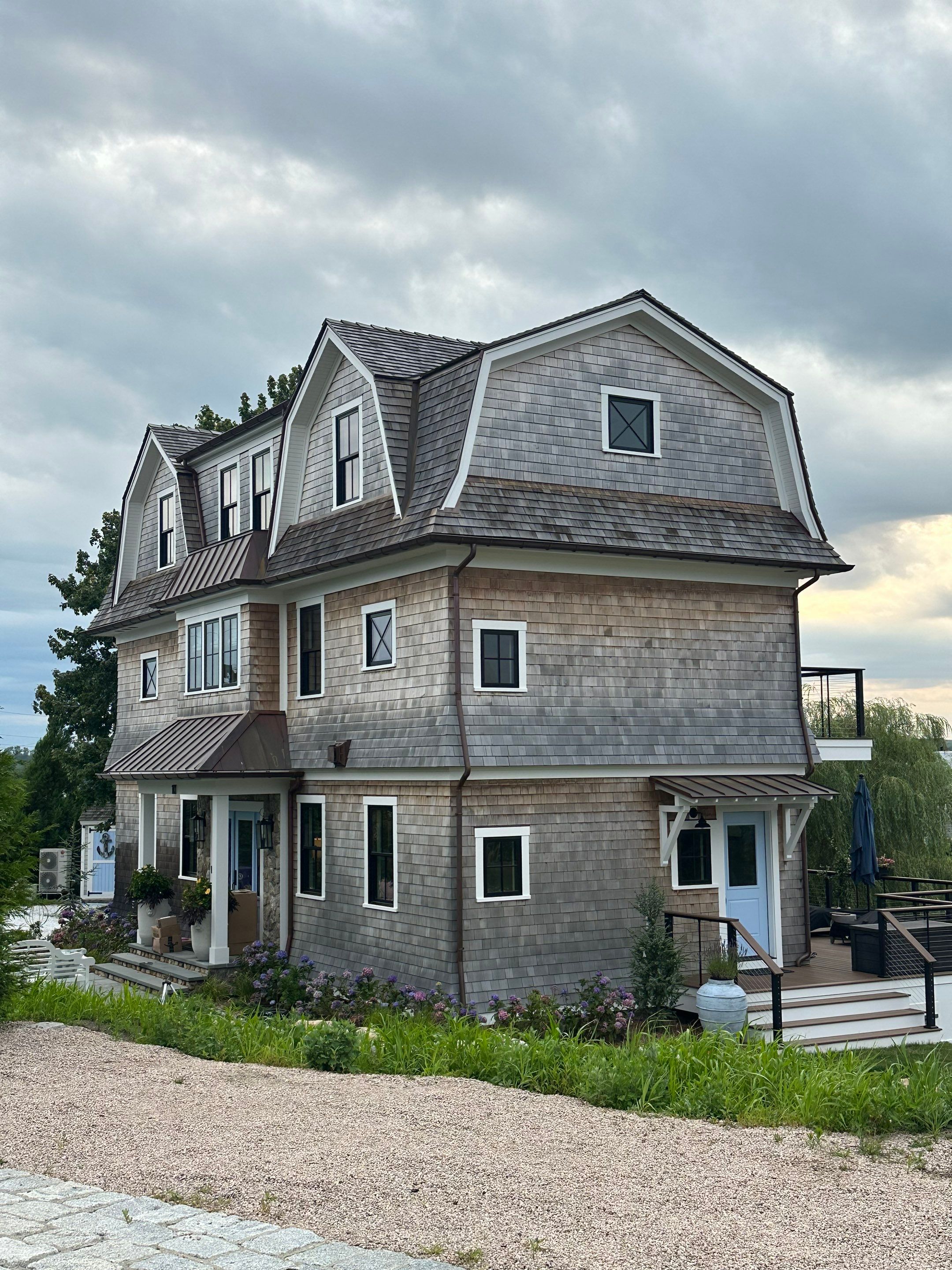 Great Island - Red Cedar Roofing, Yellow Cedar Siding, Standing Seam Copper, & Copper Gutters by Rinaldi Brothers