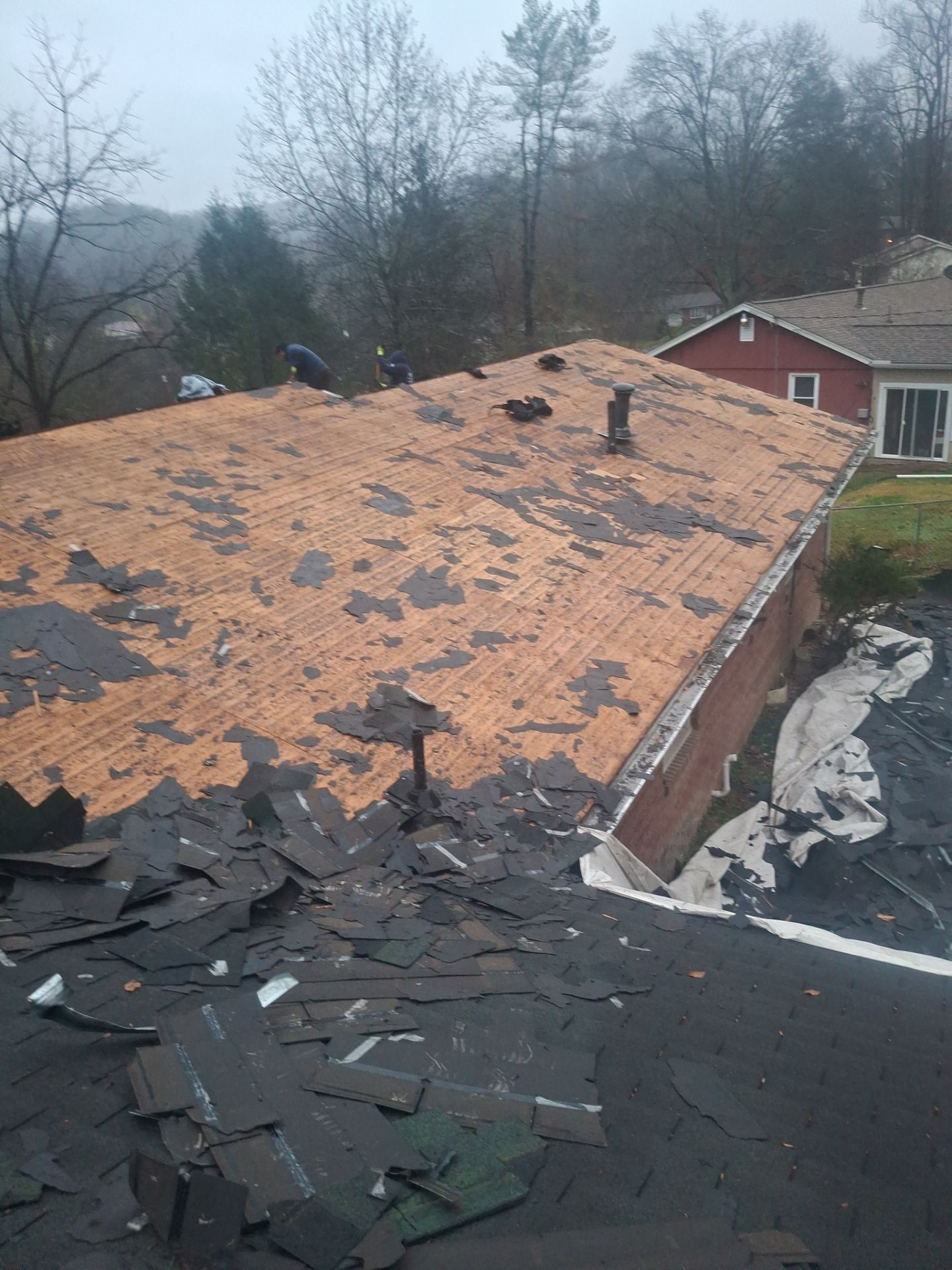 Residential Roofing Installation using GAF Timberline HDZ Charcoal by Rainstoppers Roofing