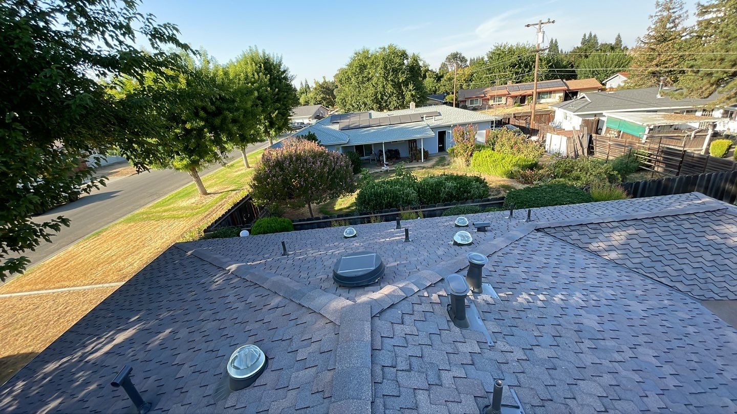 Installation of Certainteed Presidential shingles on residential house by Straight Edge Roofing Inc