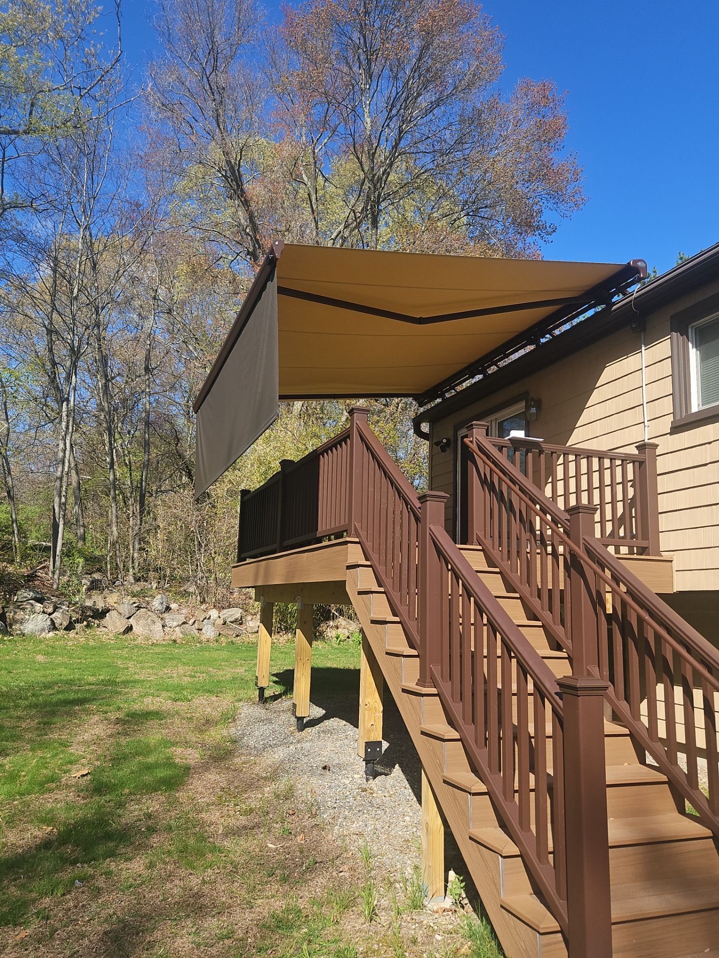 Retractable Awning Installation for Shade & Outdoor Comfort by DiGiorgi Roofing and Siding Inc