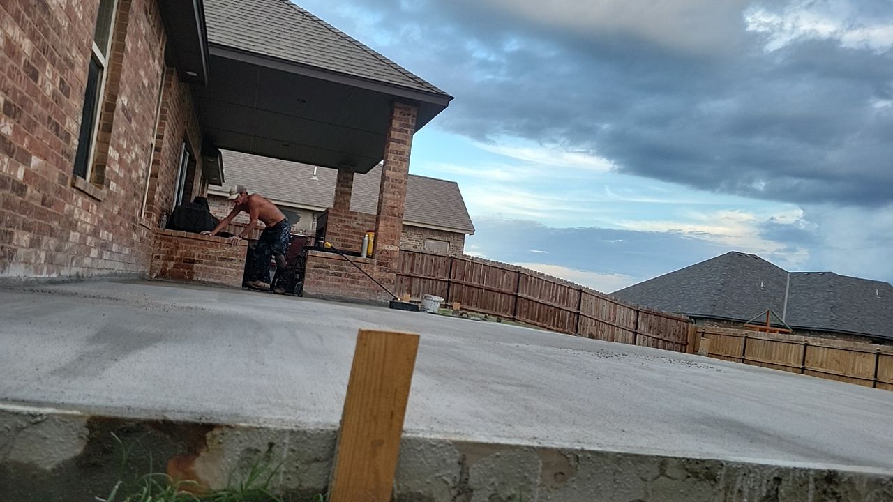 Concrete slab with Pergola by Clays Services Inc